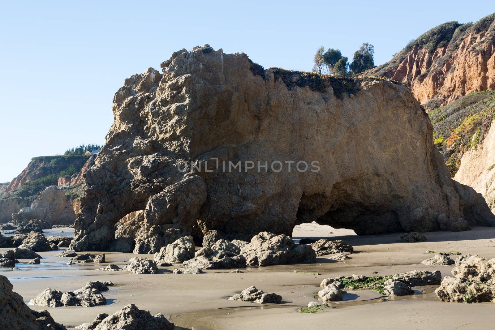Rock formation by ocean on El Matador State Beach Malibu California