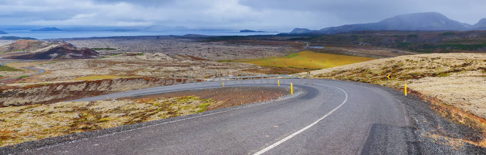 Winding road bends of Thingvellir - famous area in Iceland. Panorama