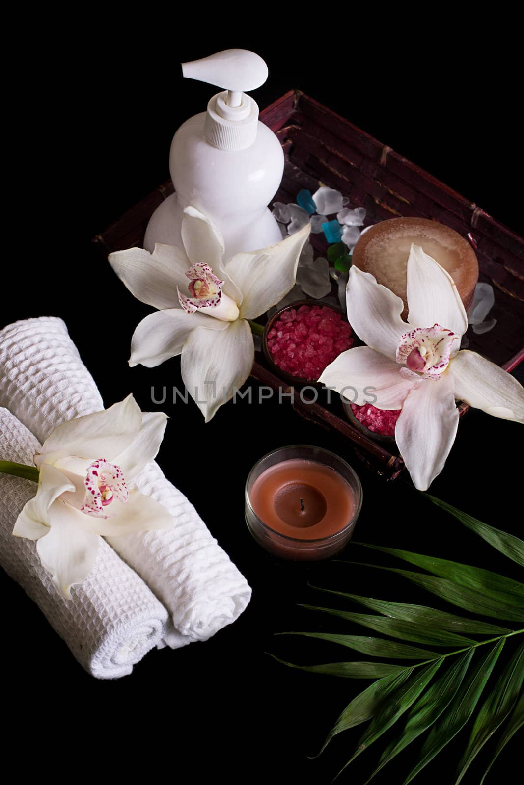 White orchids and spa treatment in wooden box by Angel_a