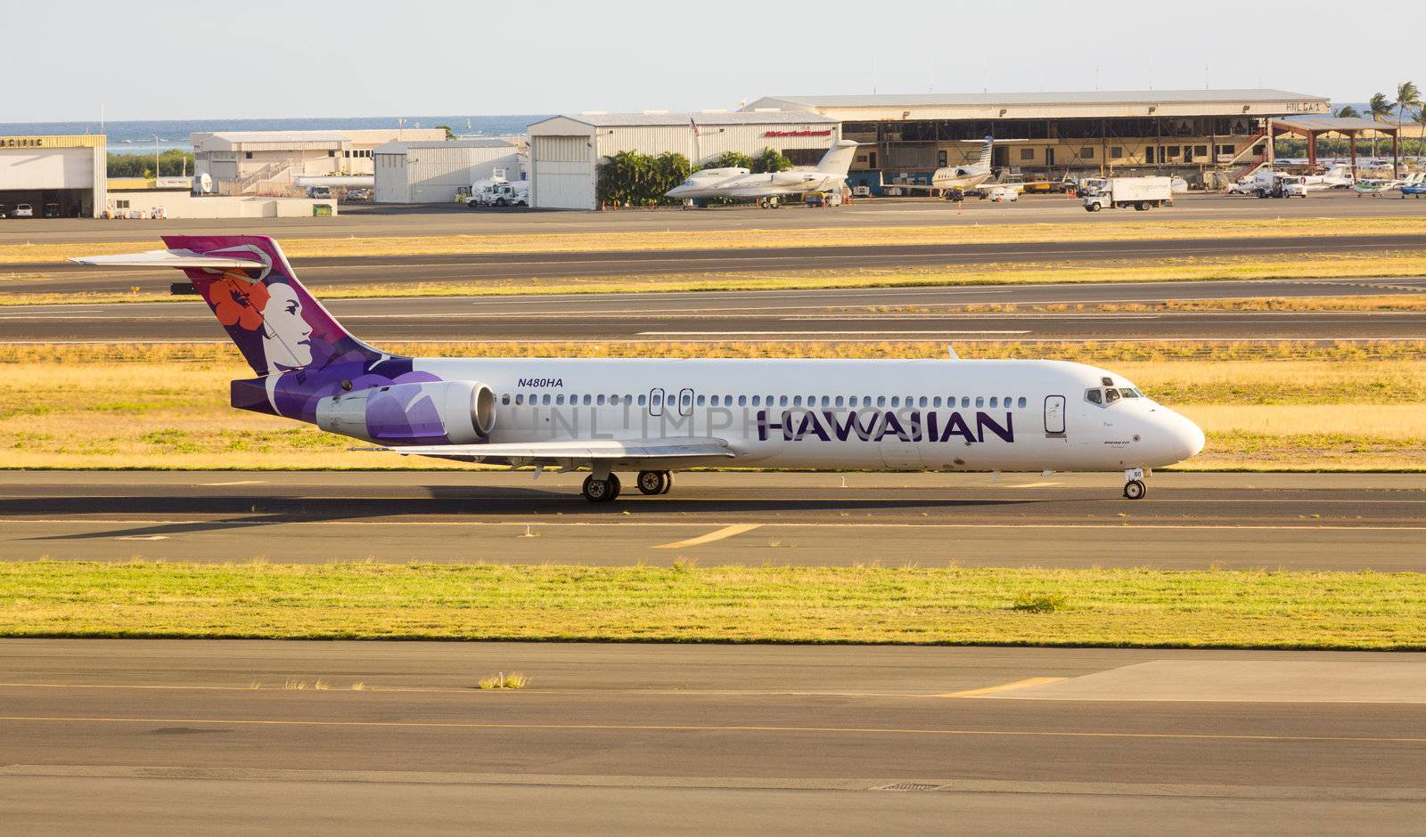 Honolulu, HI - 23 JANUARY: Hawaiian Airline Boeing 717 at Honolulu International Airport on 23 January 2013. Hawaiian Airlines is largest airline in Hawaii.