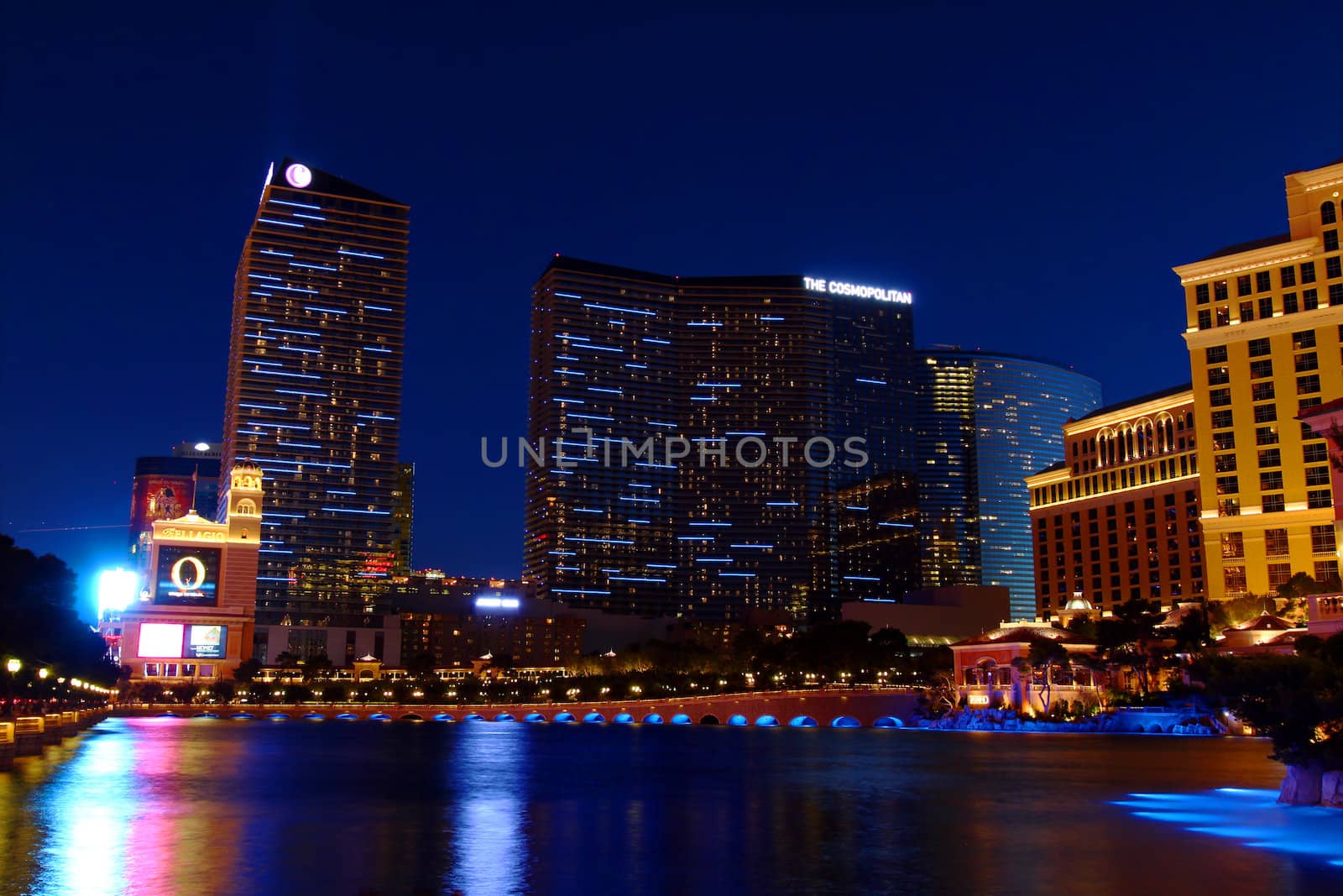 Las Vegas, USA - May 22, 2012: The Cosmopolitan of Las Vegas is a casino and hotel that opened in 2010 on the famous Las Vegas Strip.  Pictured here is the highrise hotel tower with parallel blue lights at night.