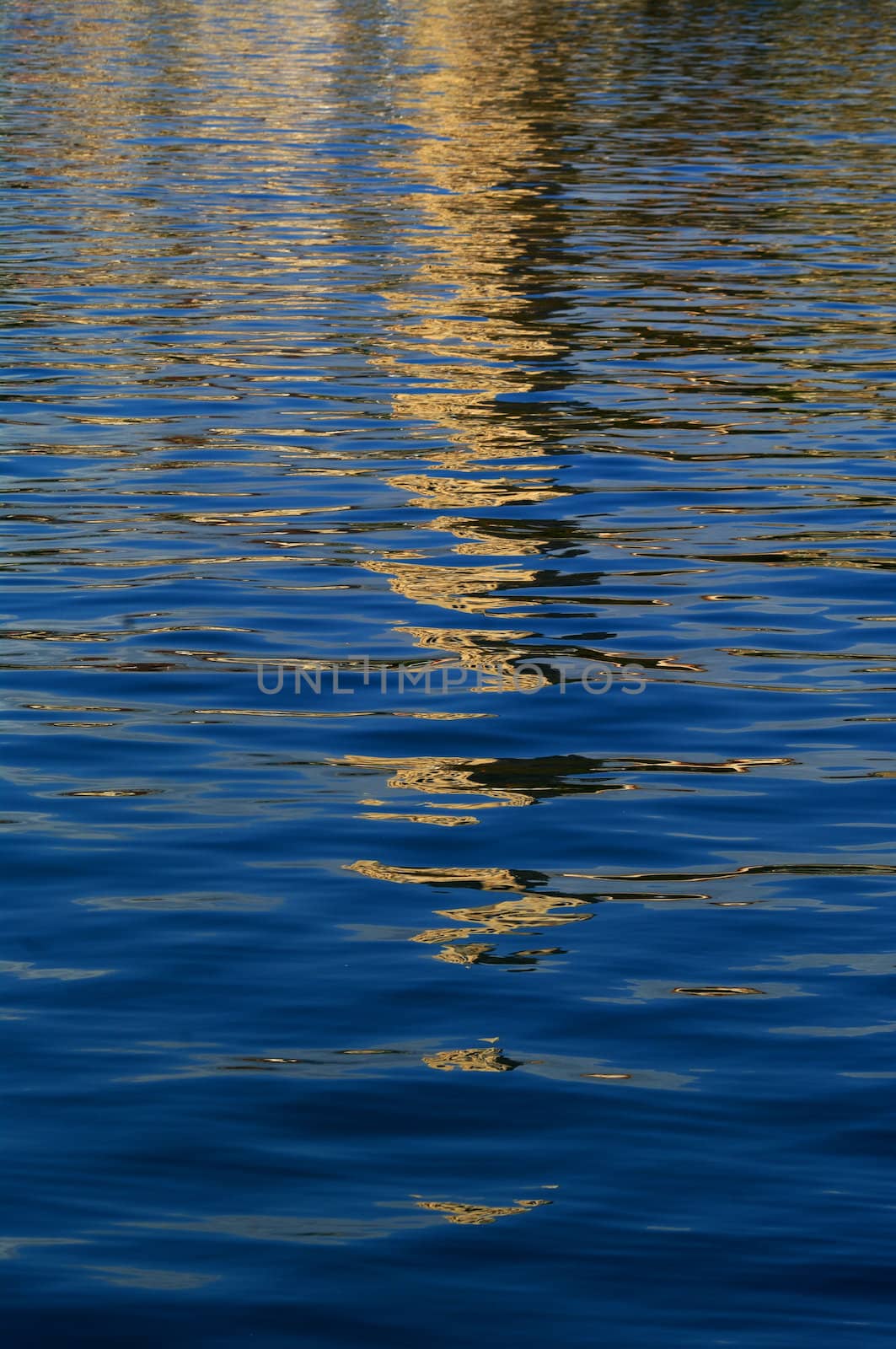 Reflection of church tower in the sea water