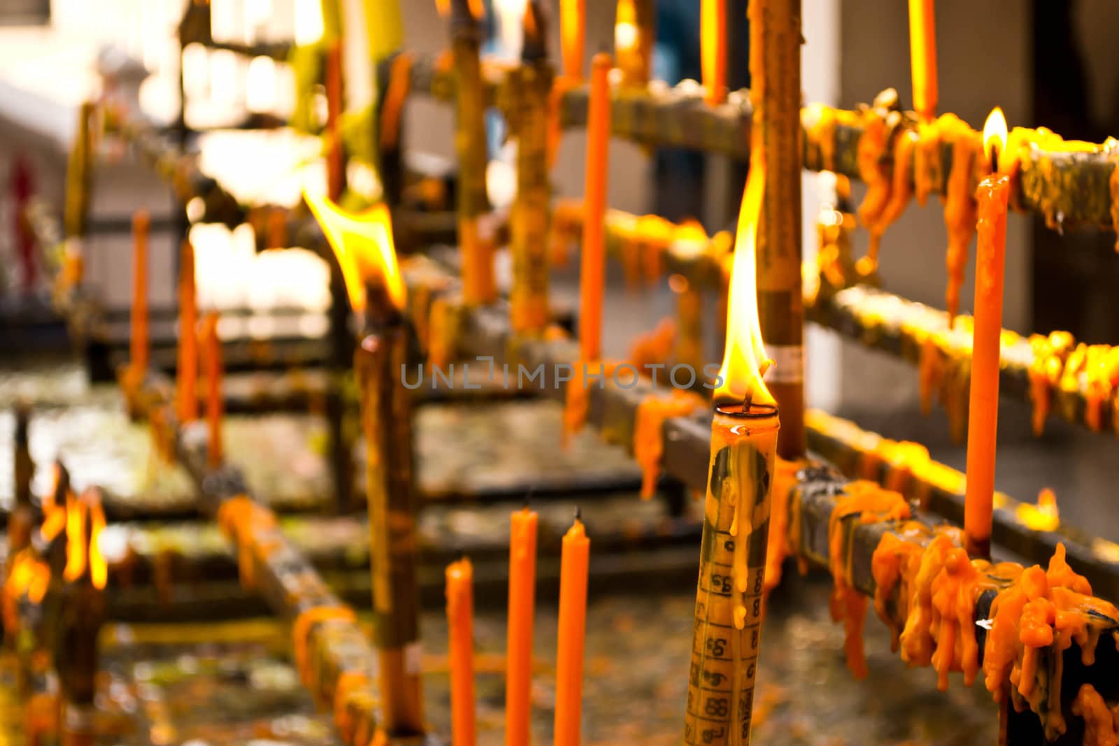 Burning candles in temple