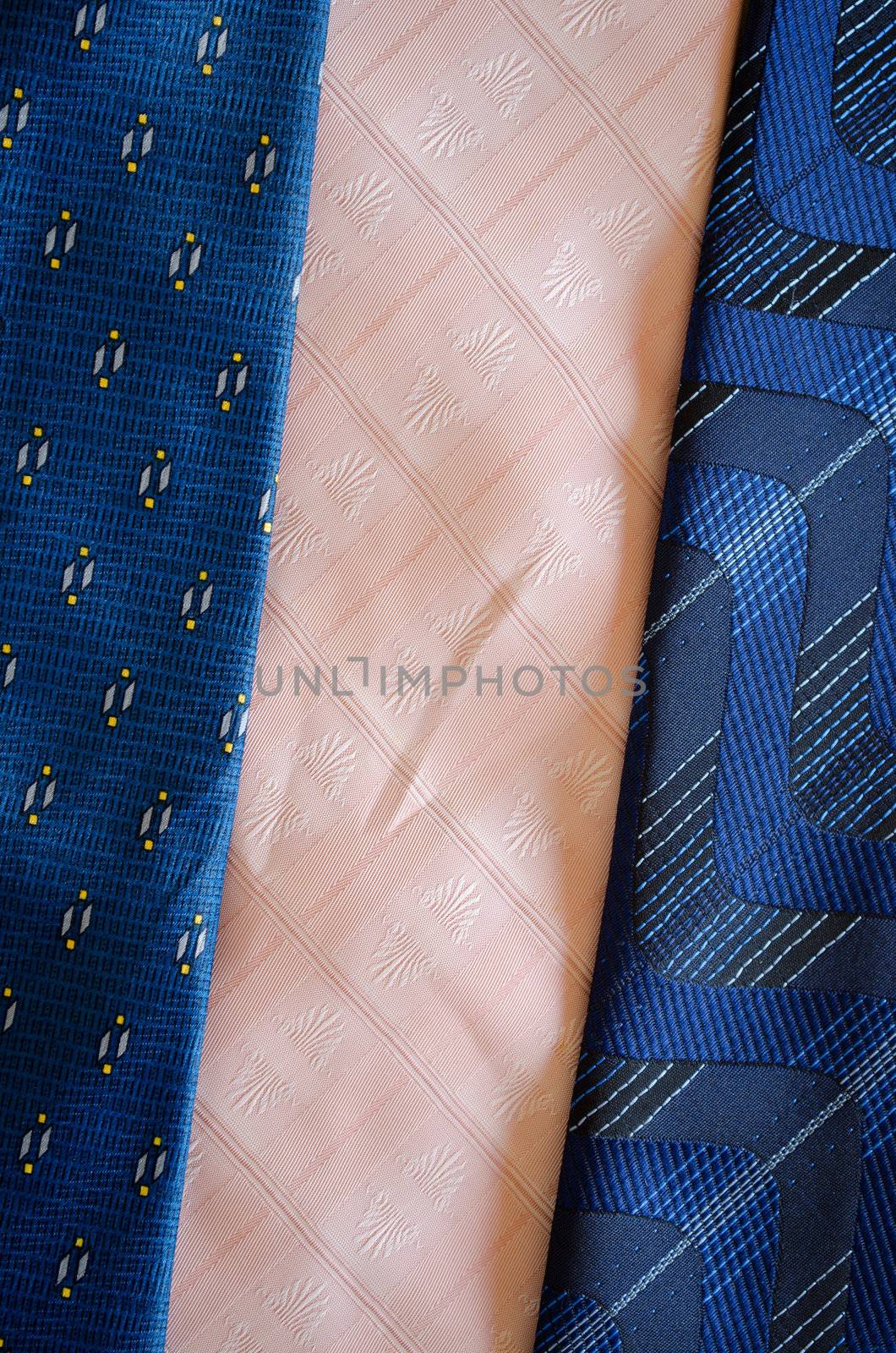 cravat tie scarfs texture pattern background. blue and pink material fashion sewings.