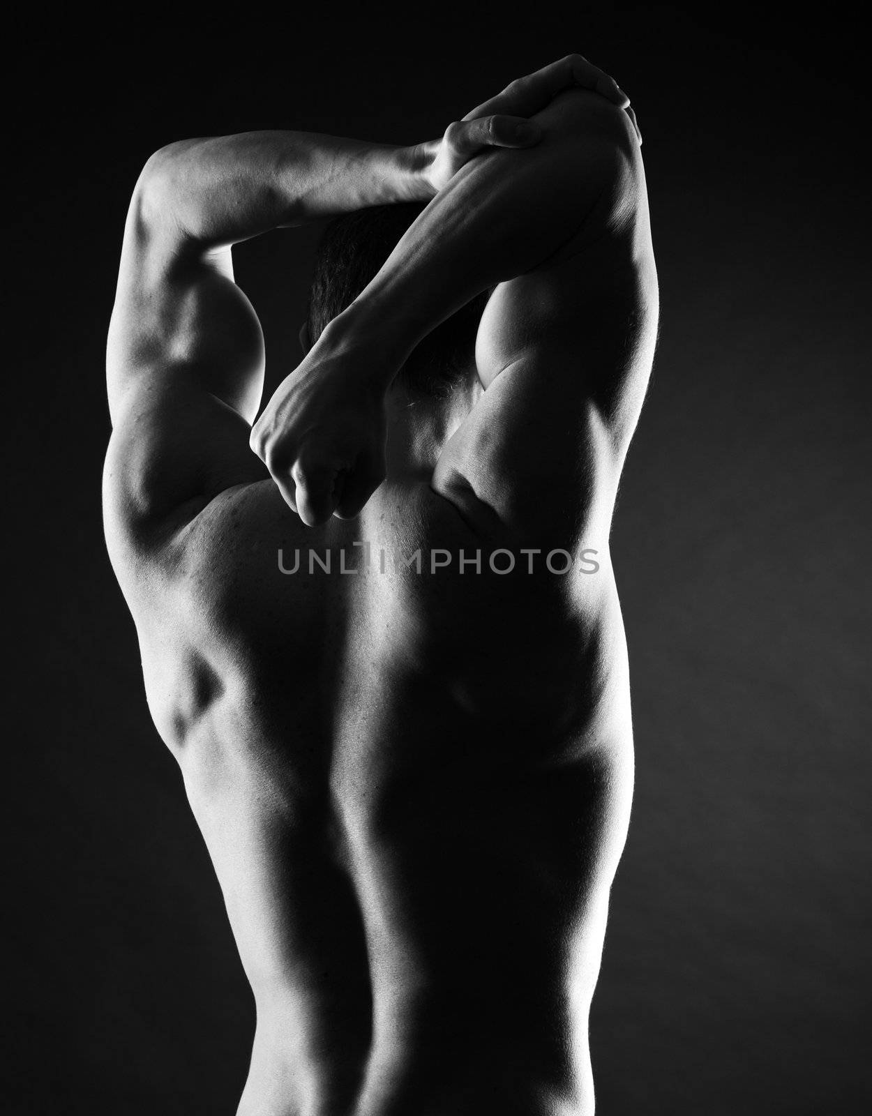 portrait of naked athlete with strong body