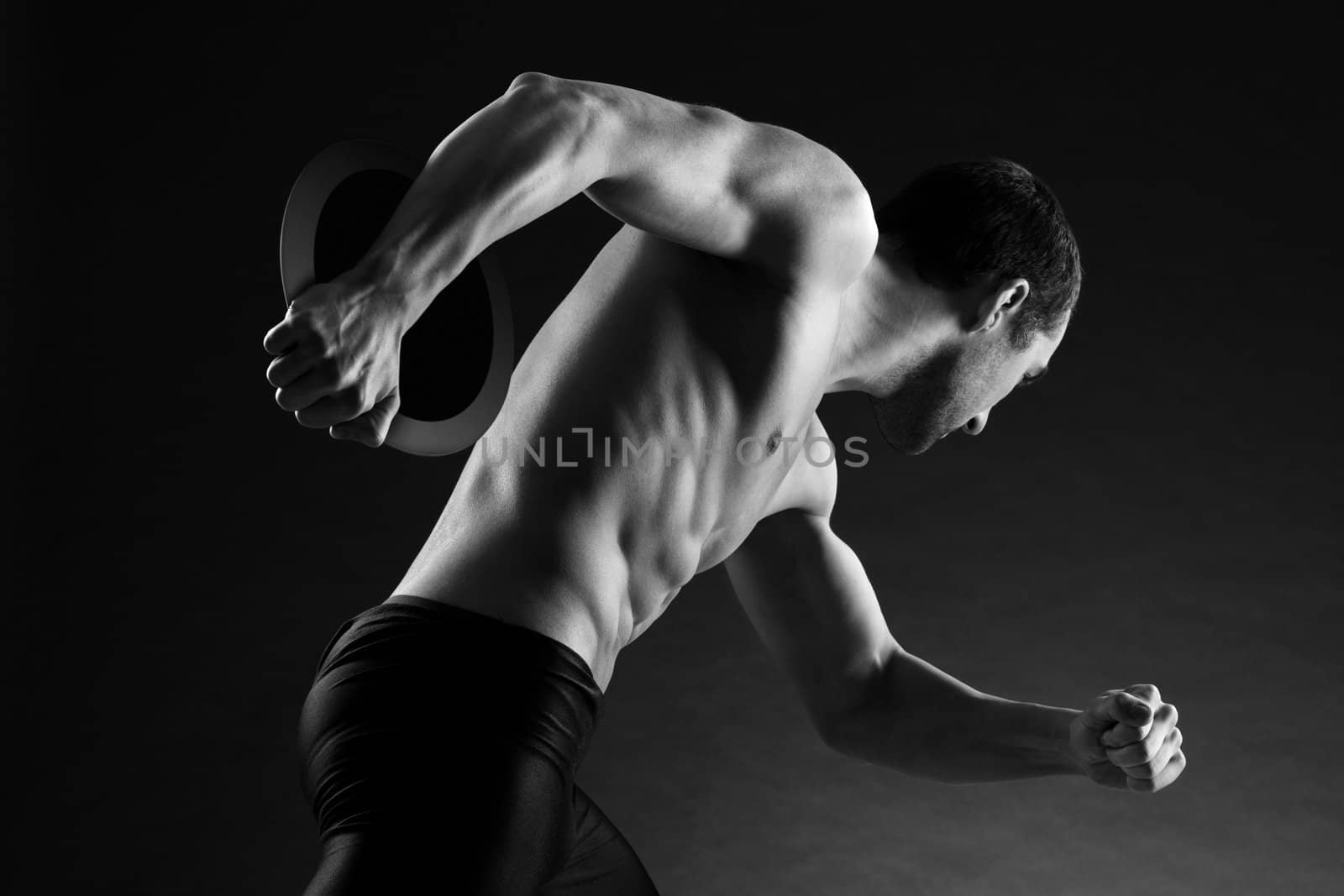 attractive young athlete: discus throwing