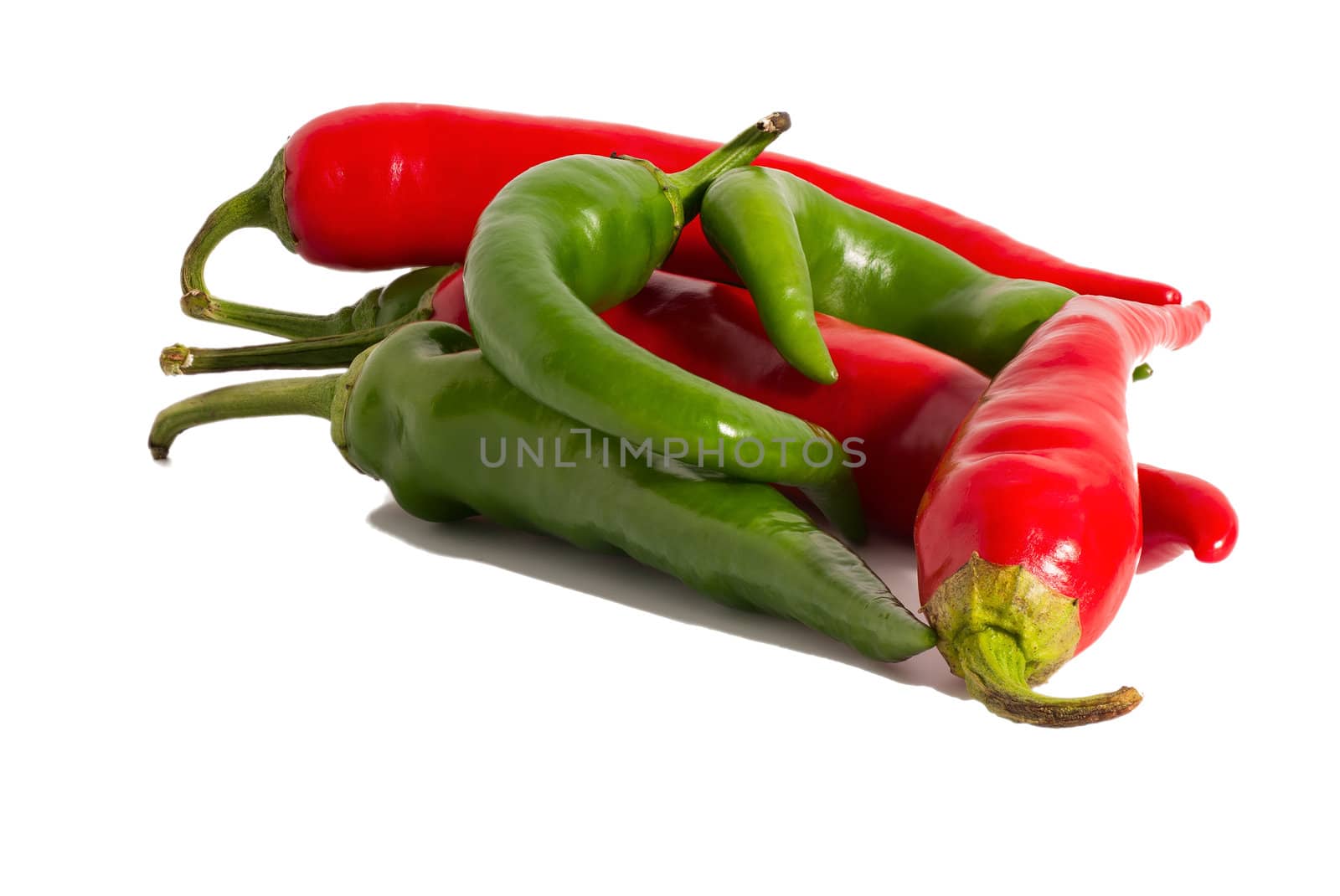 red and green hot chili peppers isolated on a white background