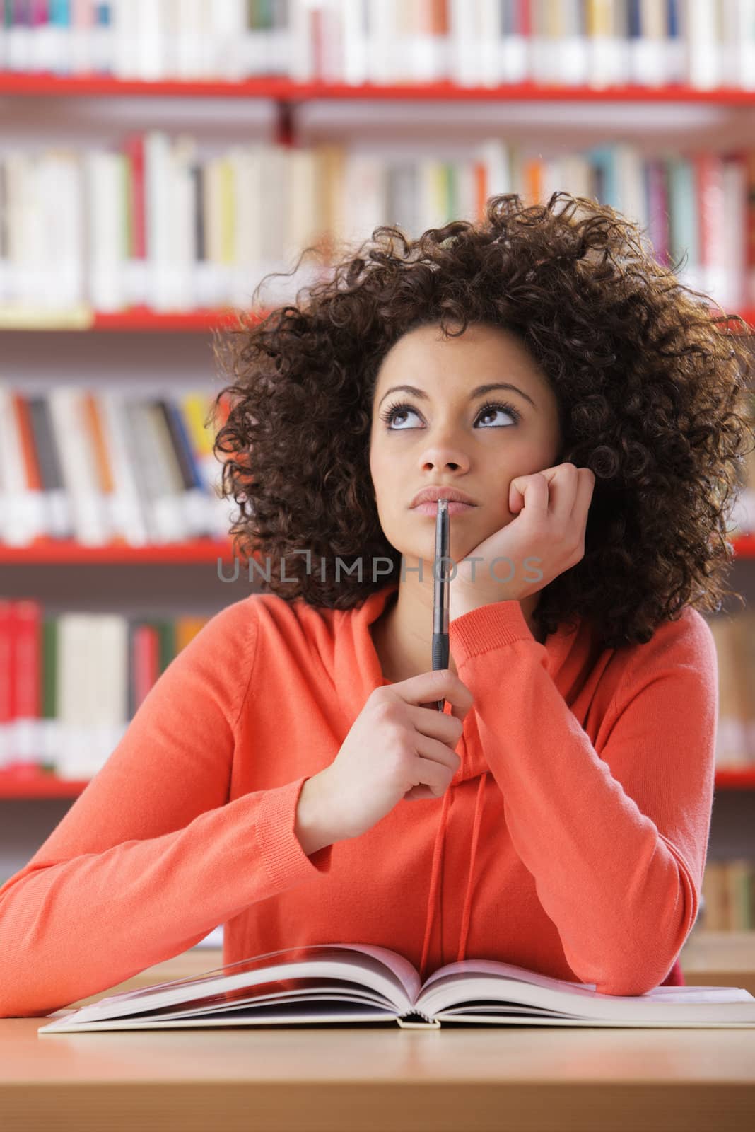 Portrait of female student in library