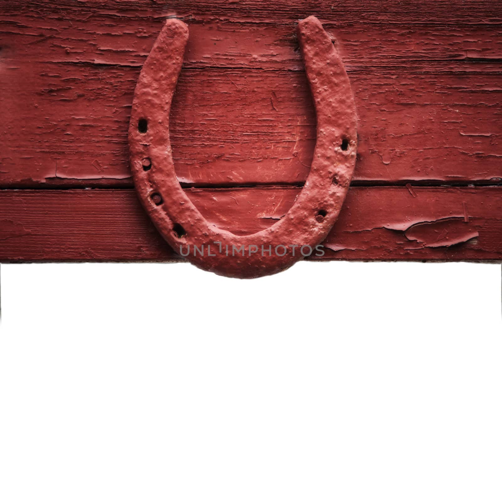 The old horseshoe hanging on wooden wall by Zhukow