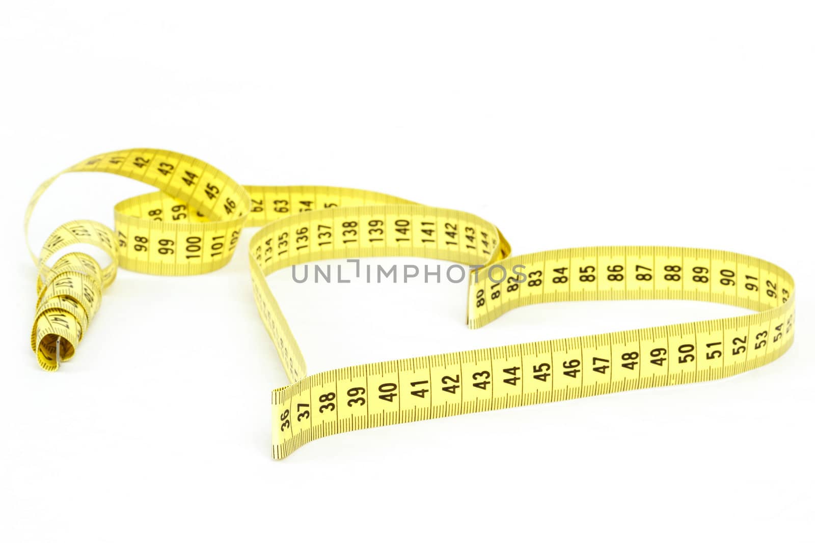 Tape measure heart shape - health, weight concept  by artush