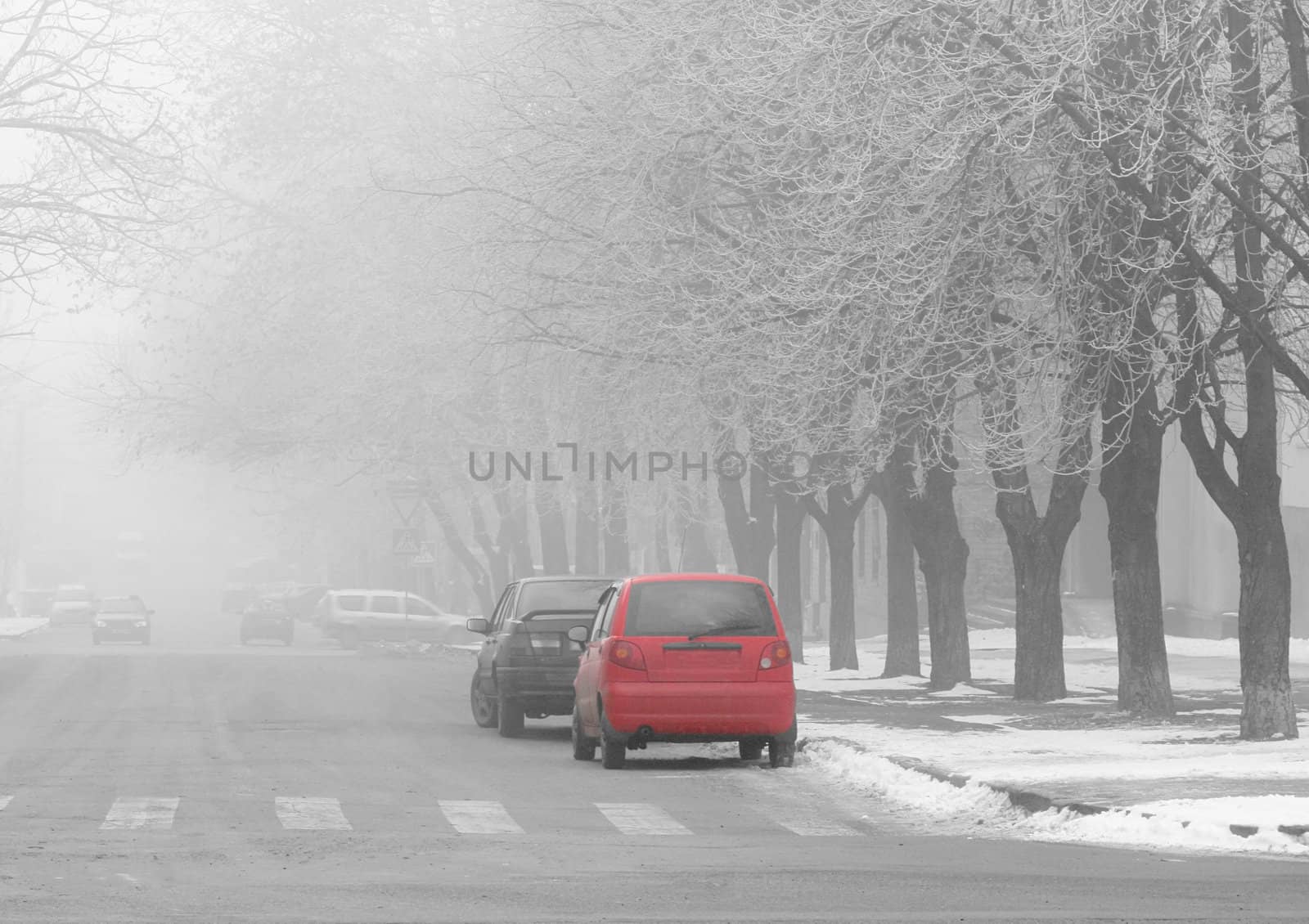 street of town at foggy winter morning