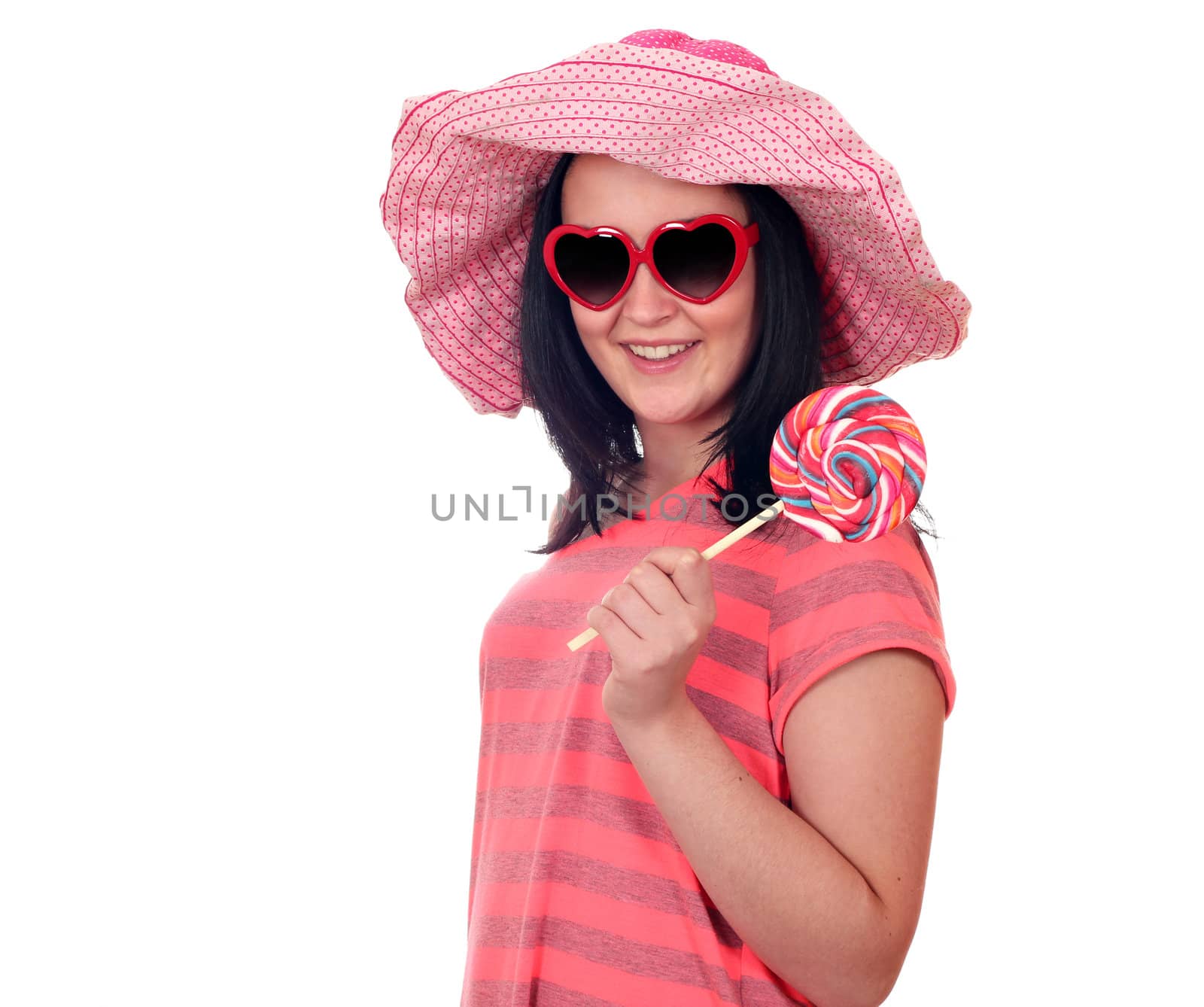teenage girl with lollipop on white