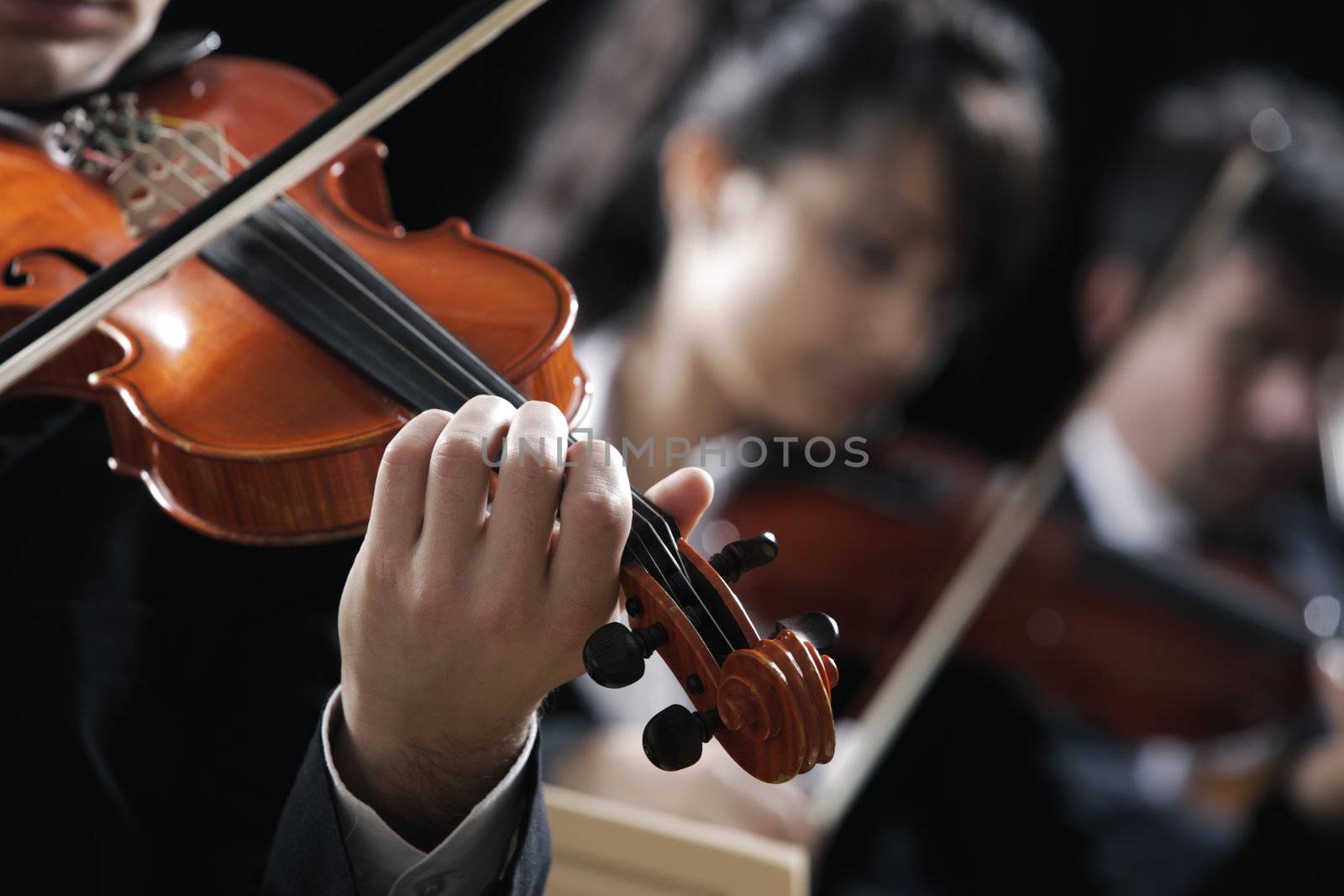 Classical music. Violinists in concert by stokkete