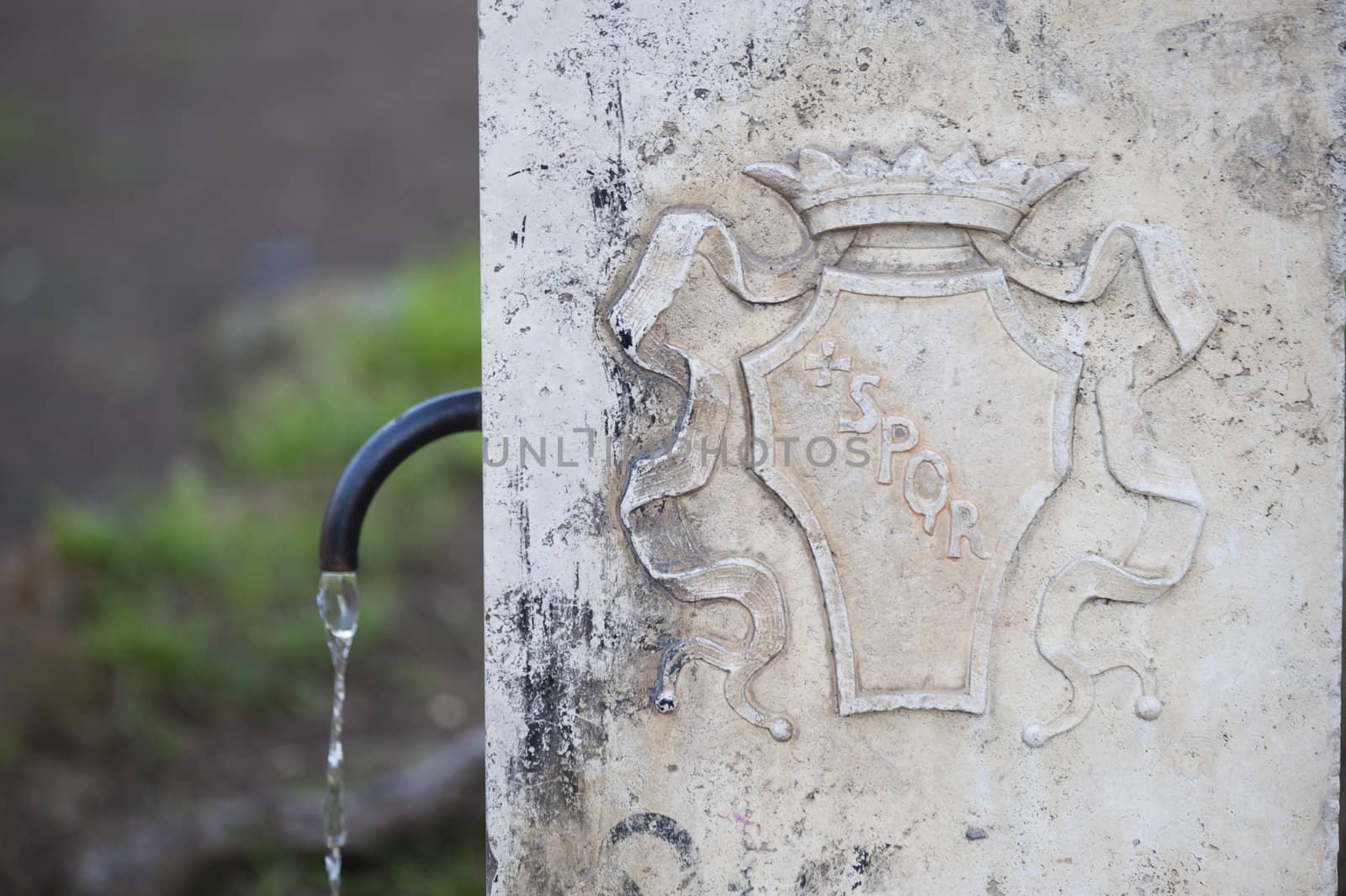 Typical public water fountain in Rome