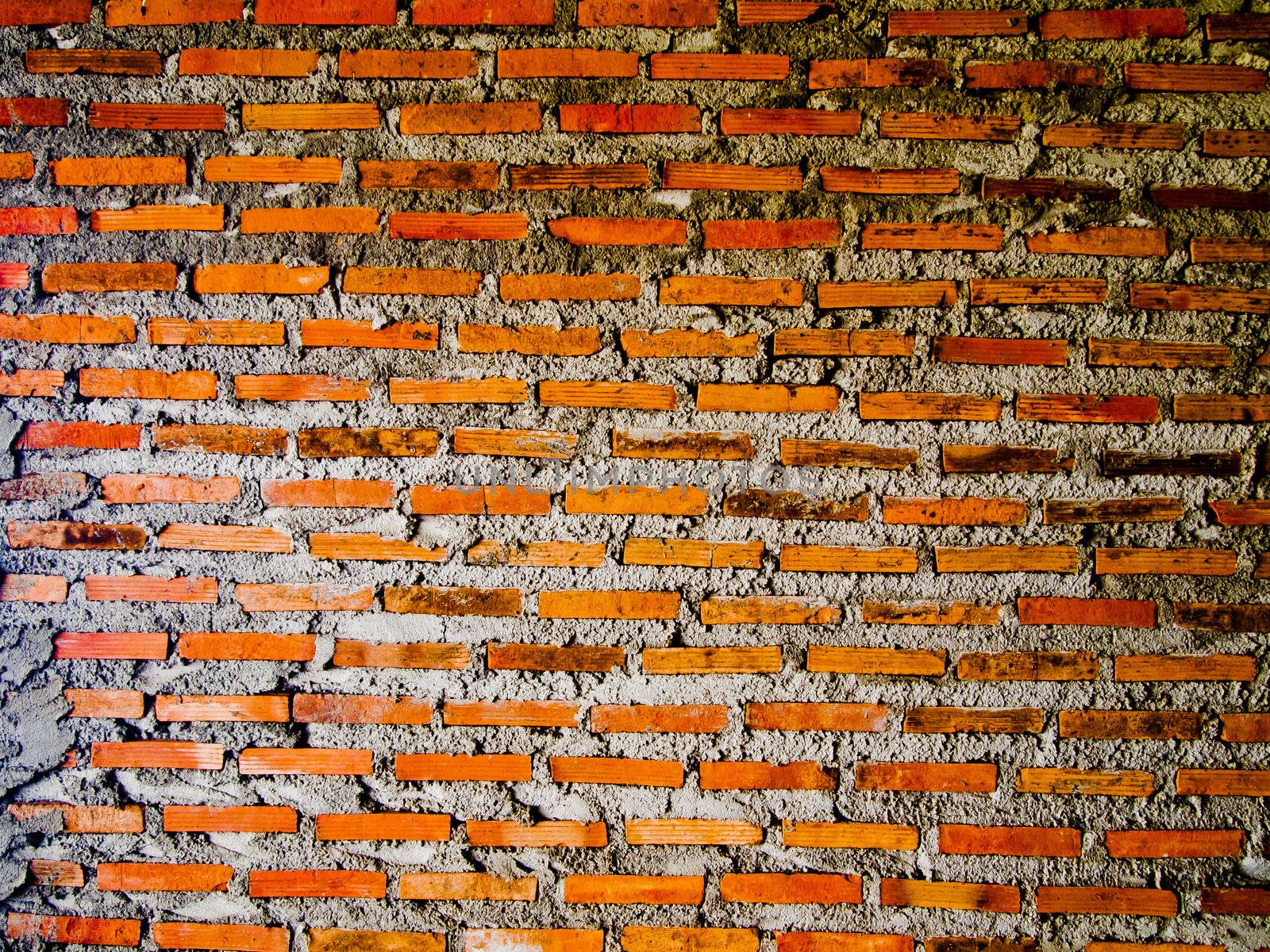 Cement brickwork wall by gjeerawut