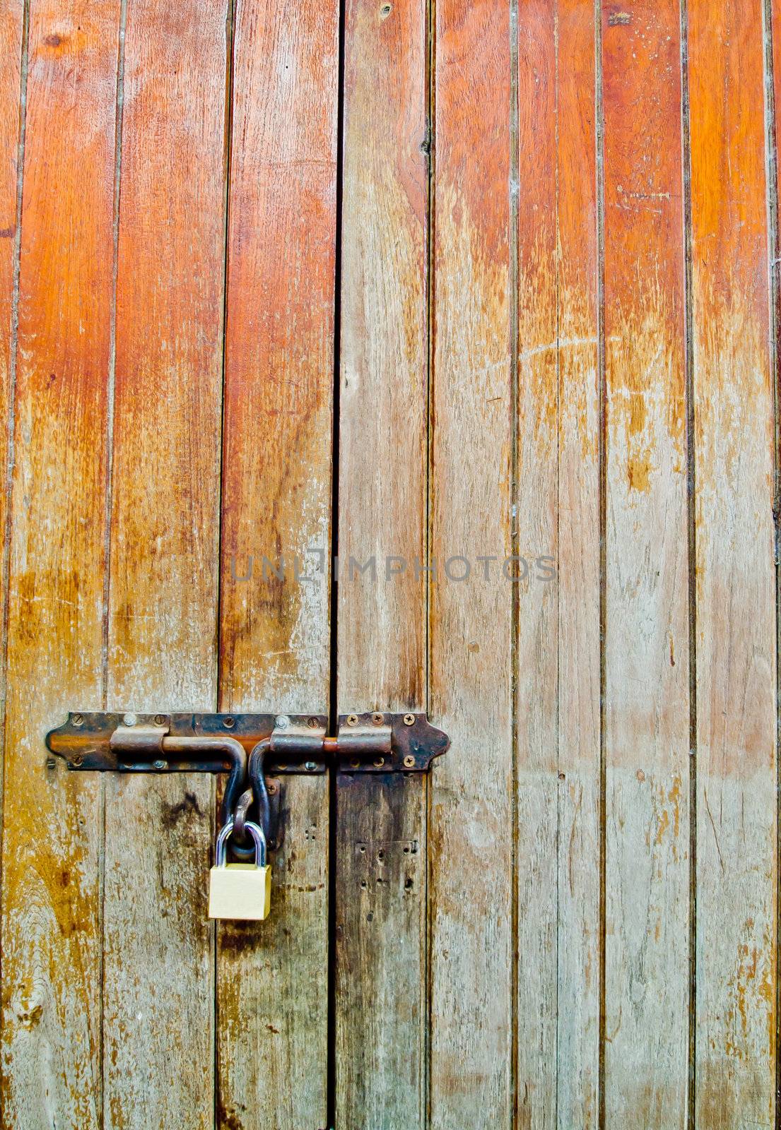 Old wood door with Lock1 by gjeerawut