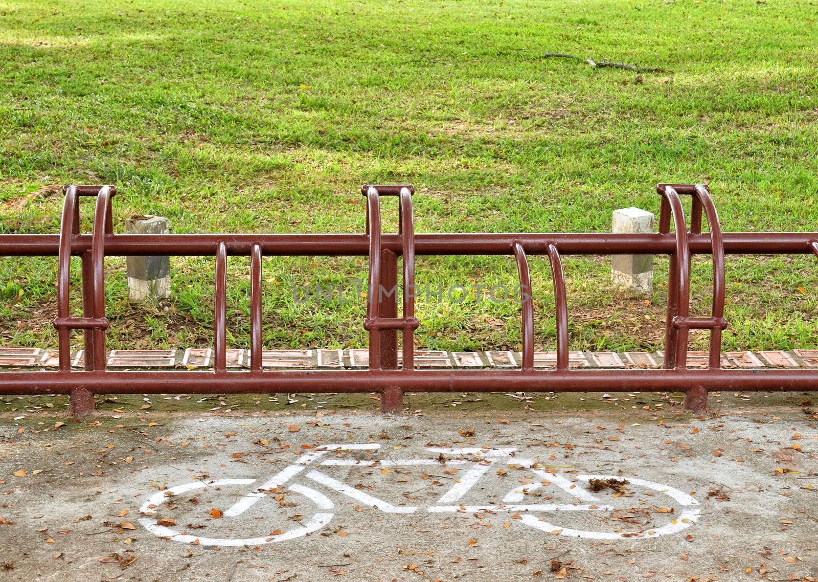A sign of bicycle path  and Parking
