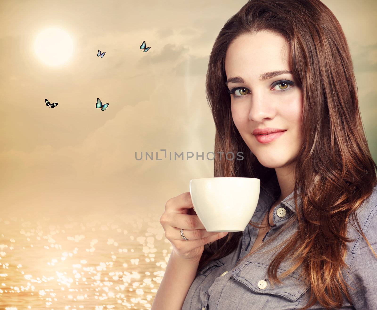 Beautiful young women drinking a hot beverage under the moon light with butterflies
