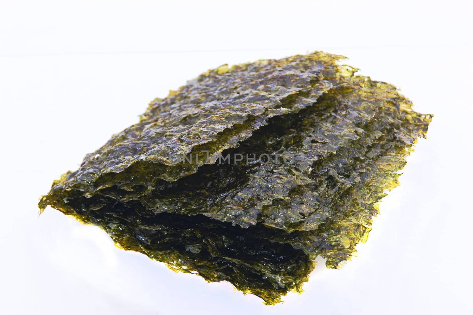 East cooking - Crispy seaweed isolated on white by Noppharat_th