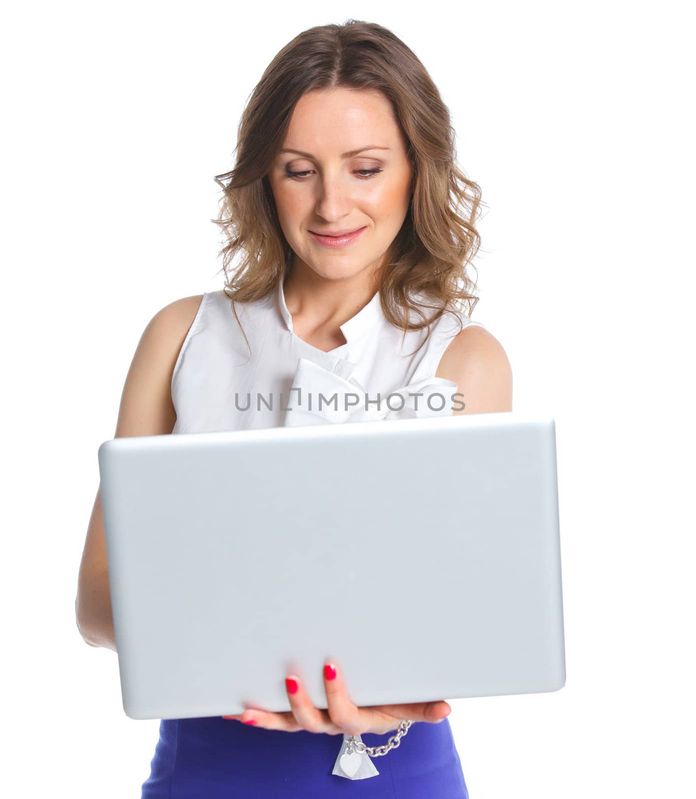 Portrait of a happy young business woman standing with notebook against white background