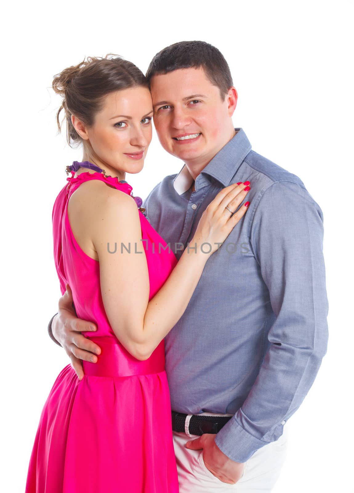 Portrait of a beautiful young happy smiling couple. Isolated white backround