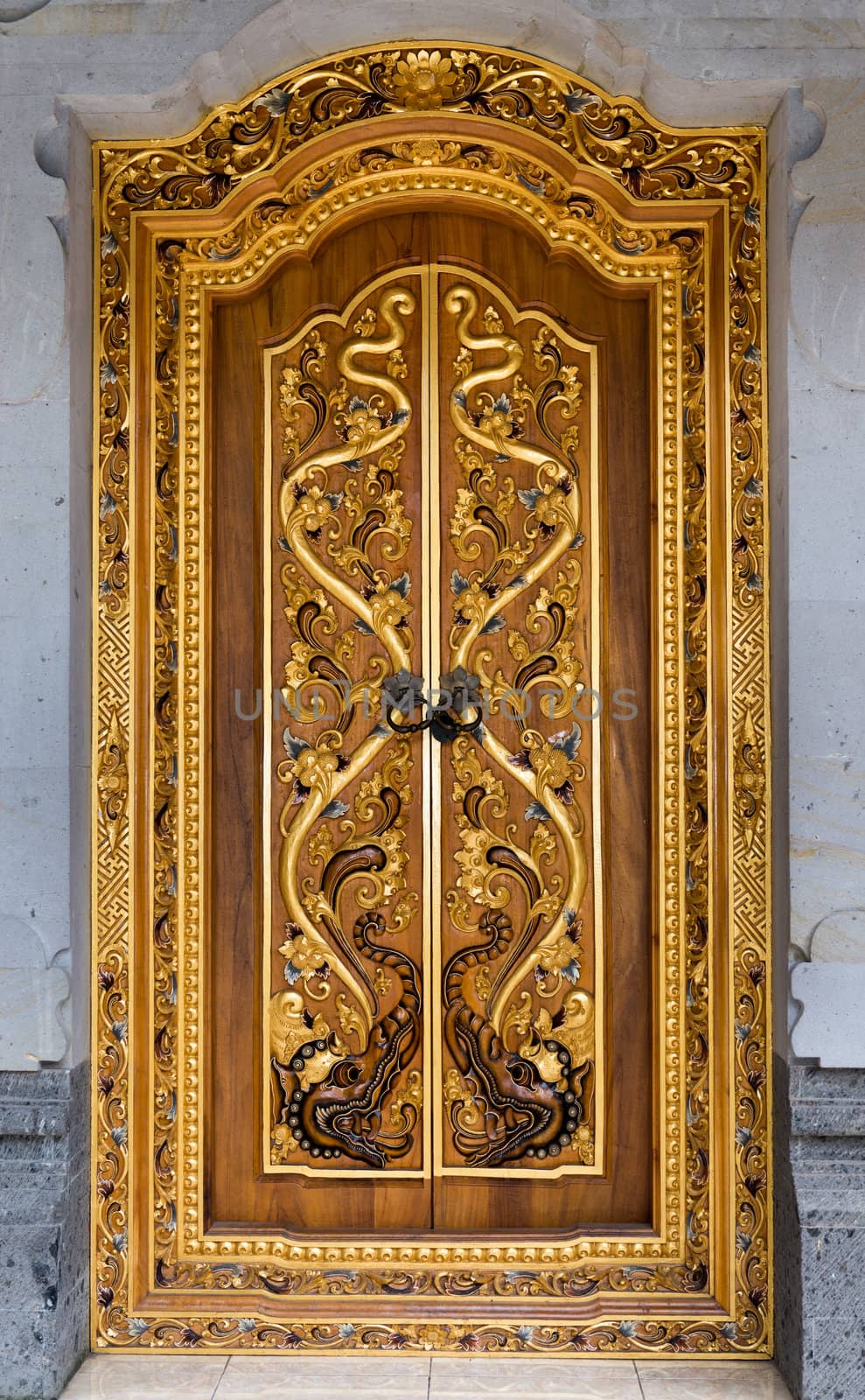 Balinese carving door in Batuan temple, Bali  by iryna_rasko