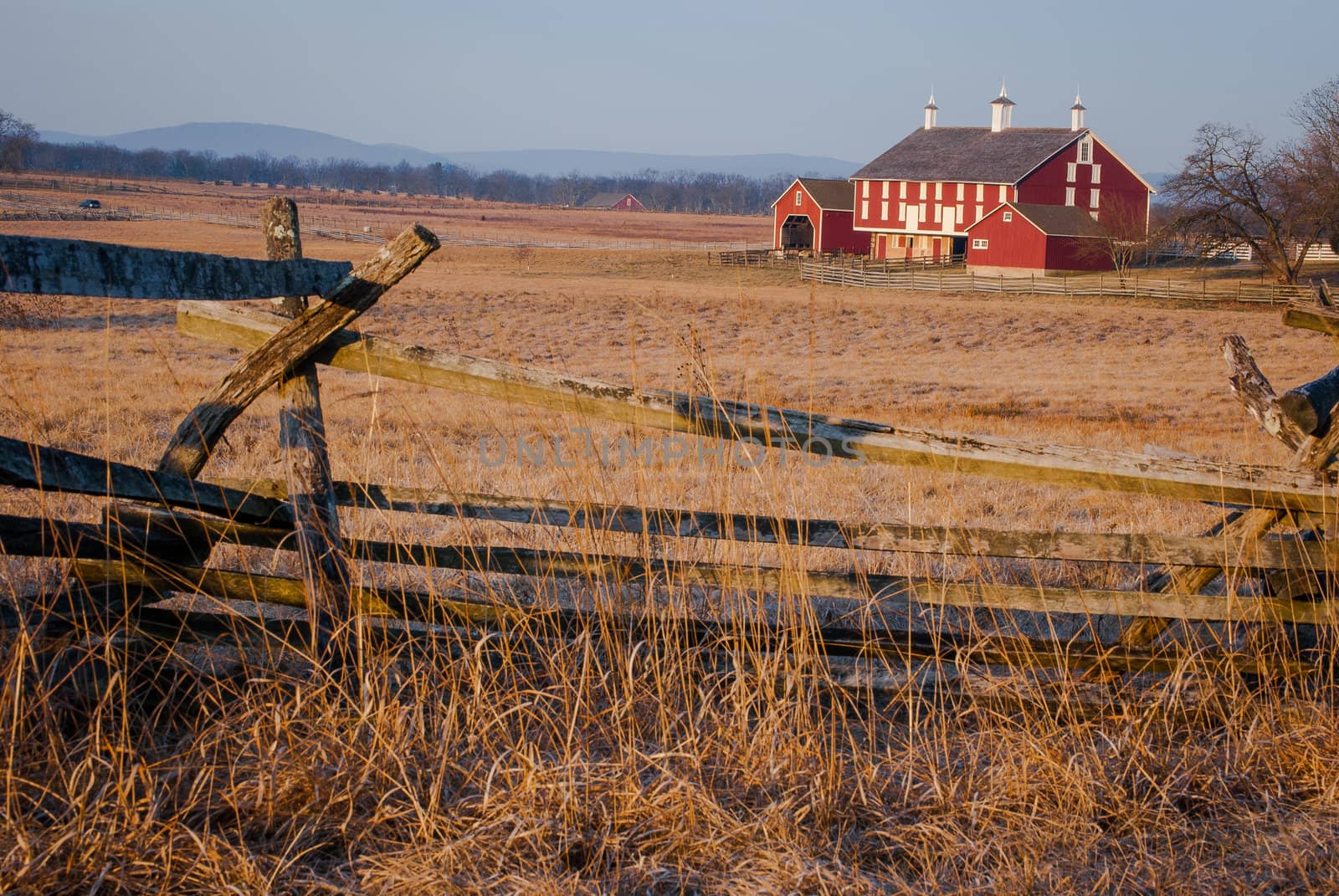 Fence Field and Large Red Barn by oliverjw