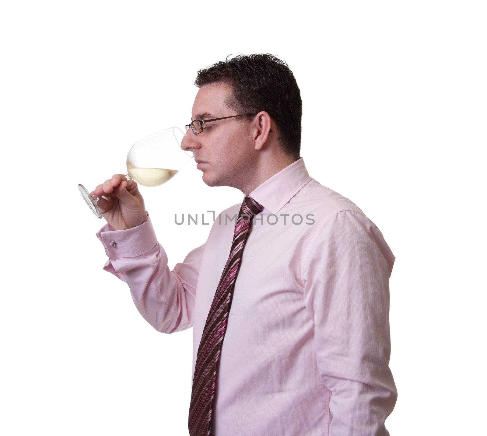 Man smelling a glass of white wine by doble.d