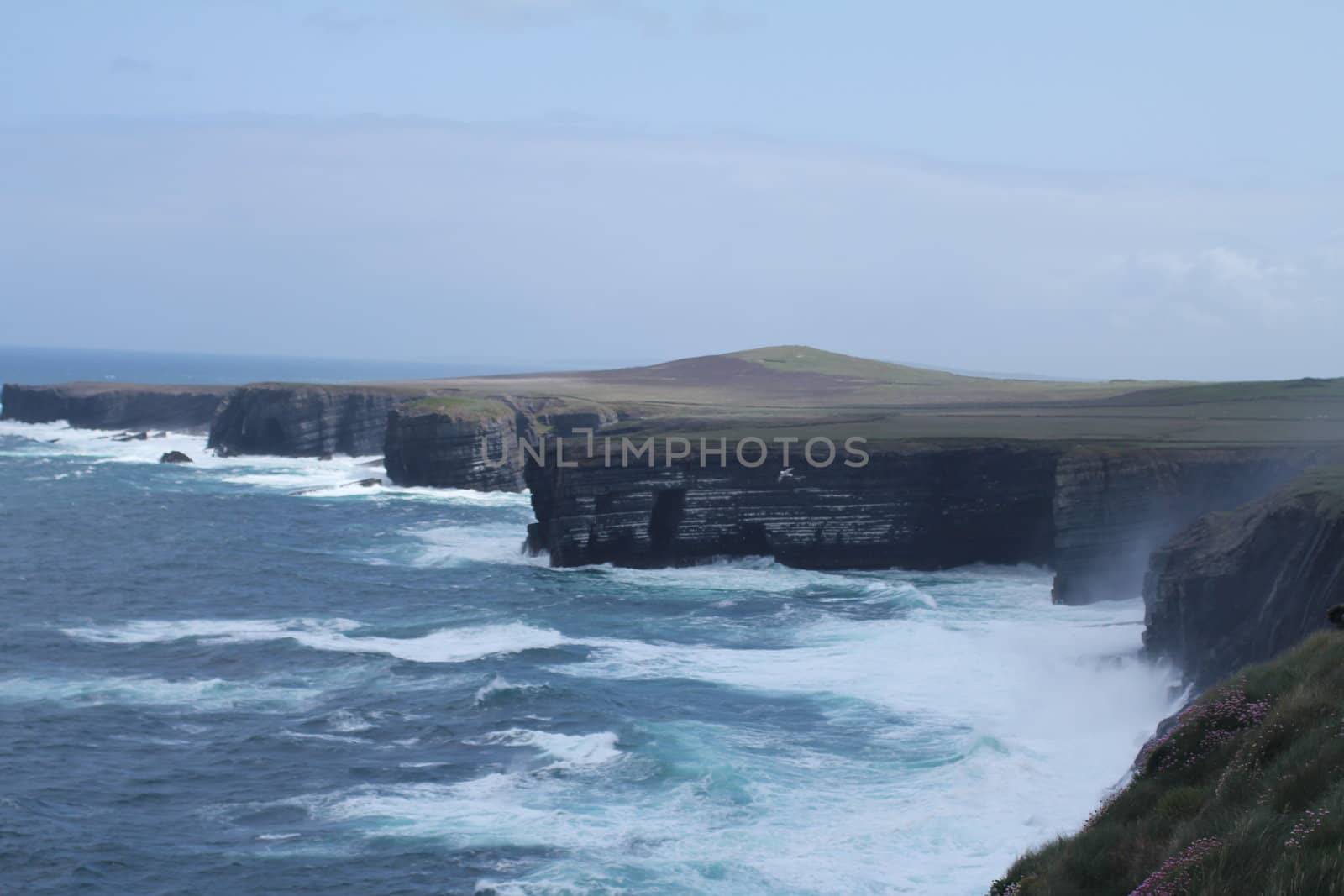 Cliffs and rough sea in Ireland
