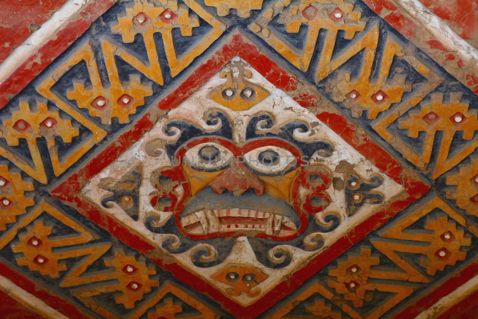 Painted religious figure on adobe wall in Huaca de la Luna archaeological site in the Moche valley, Peru
