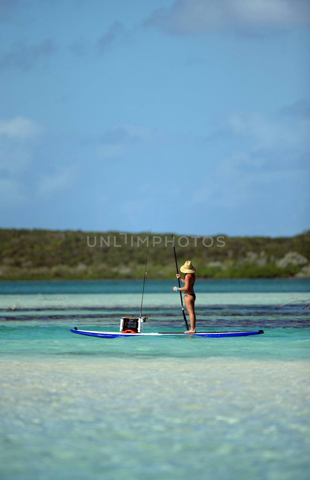 fishing on paddleboard by ftlaudgirl