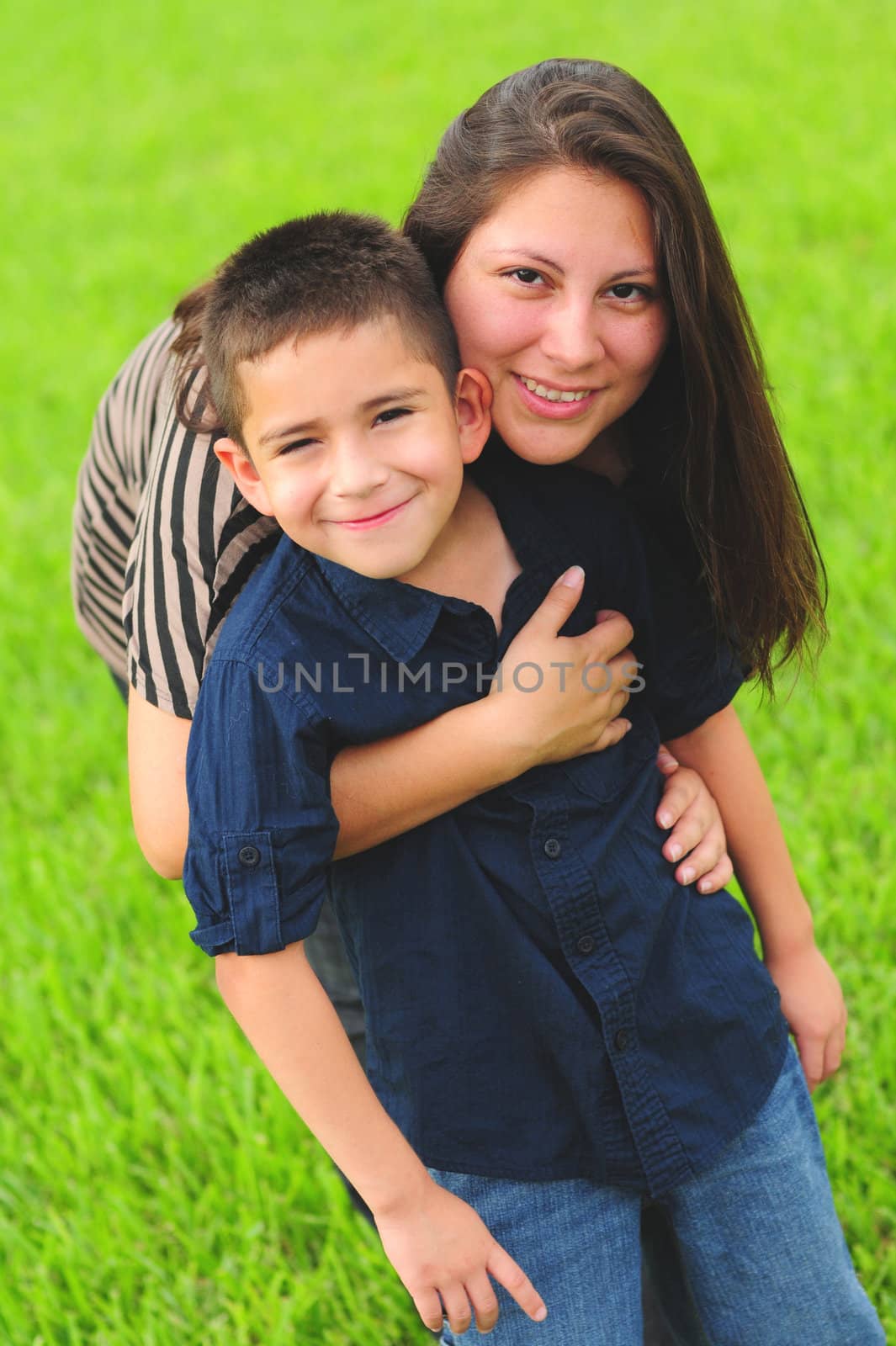 Beautiful mom hugging son by ftlaudgirl