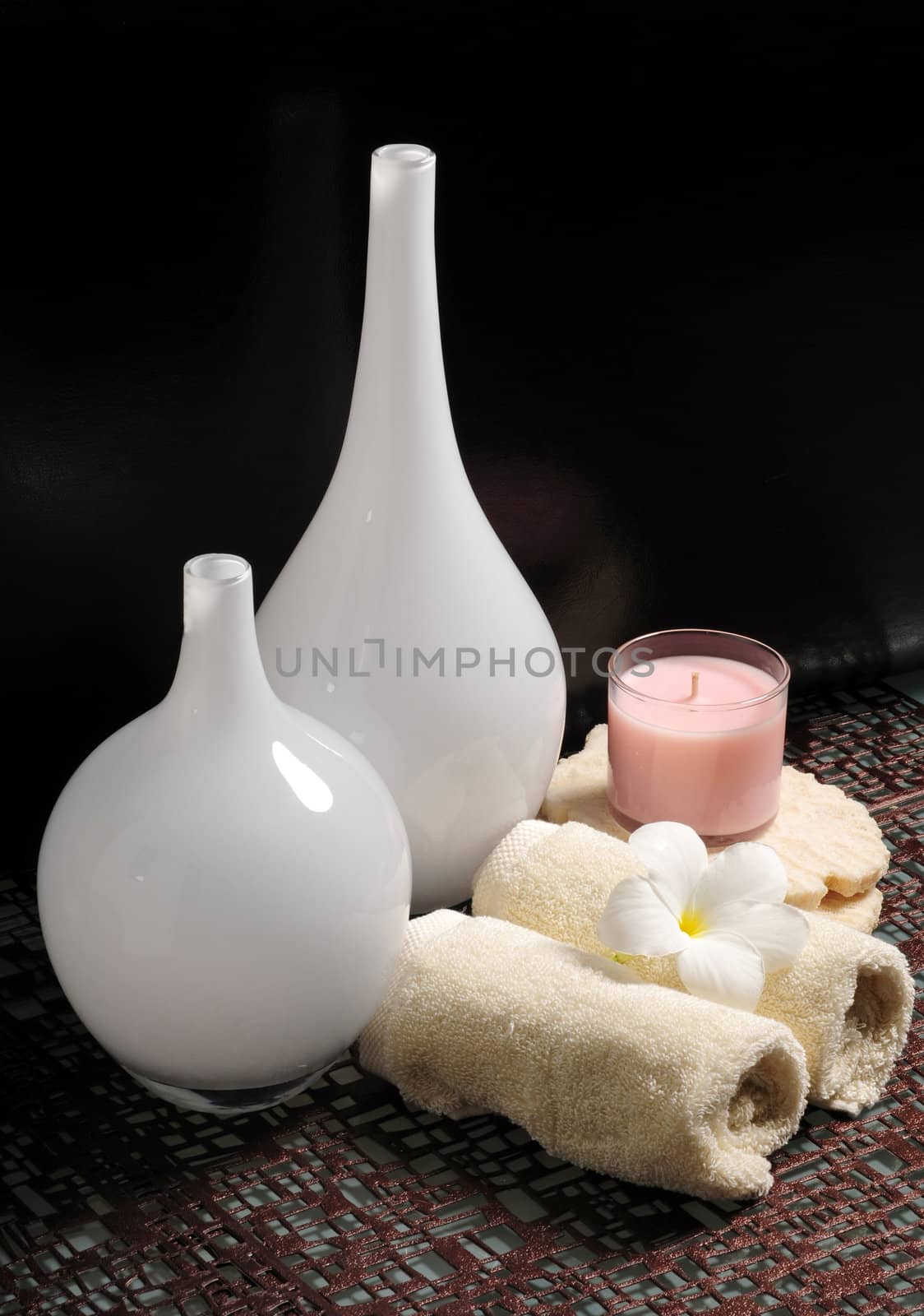 An arrangement of items used at a day spa for a relaxing experience