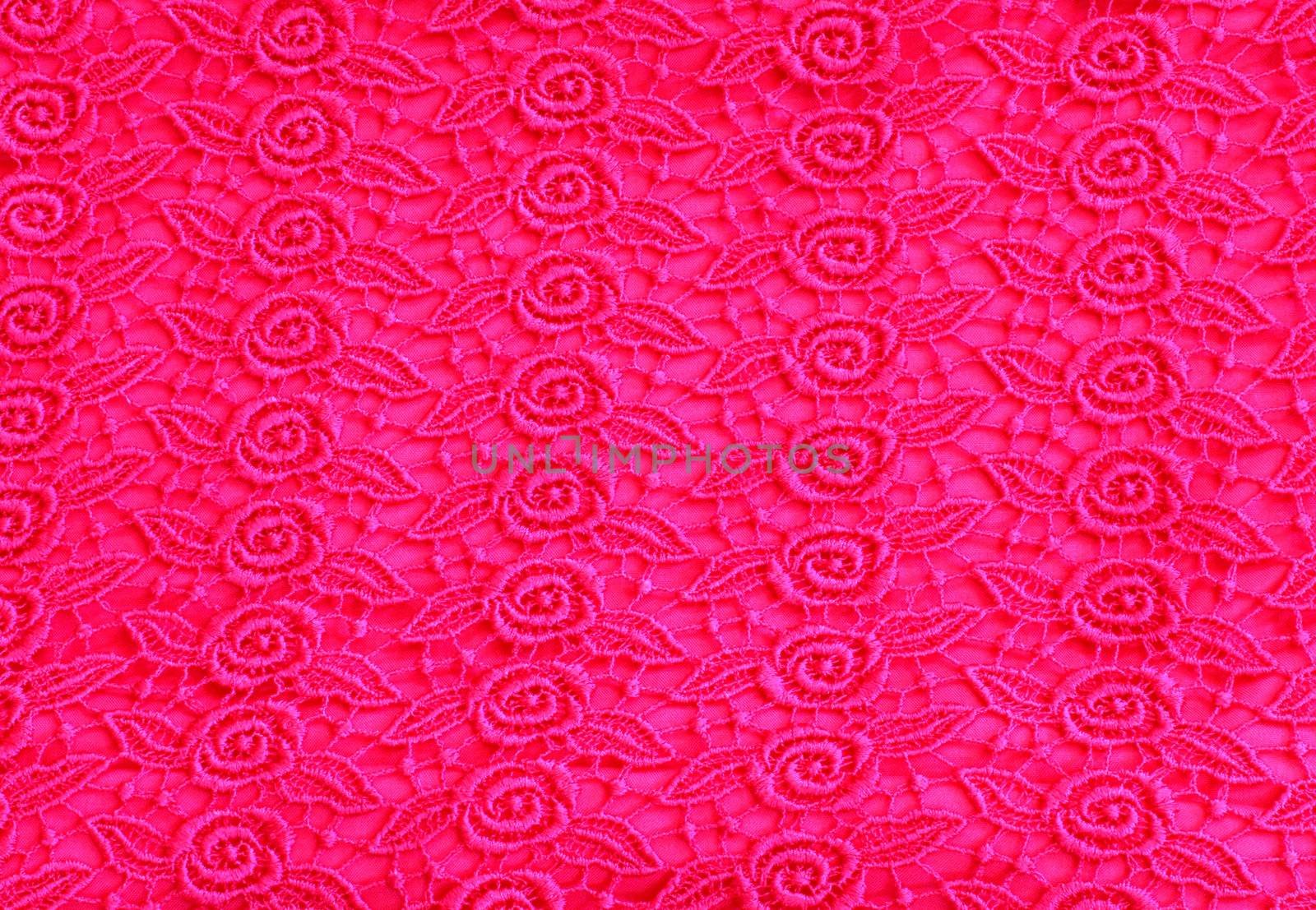 Detail of pink lace pattern fabric 