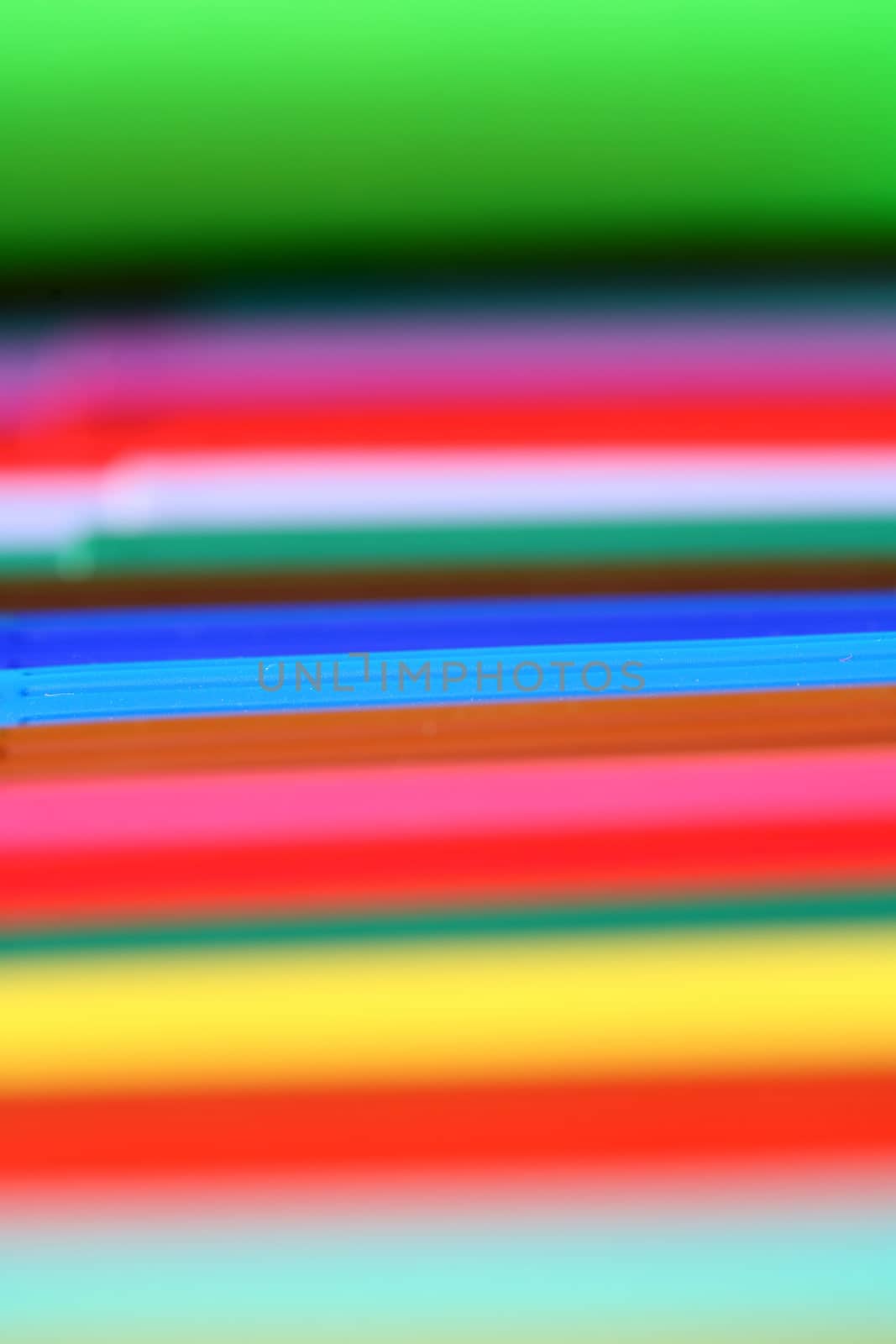 not created abstractions, curves, lines, patterns, here close up picture of children pencils with narrow dof

