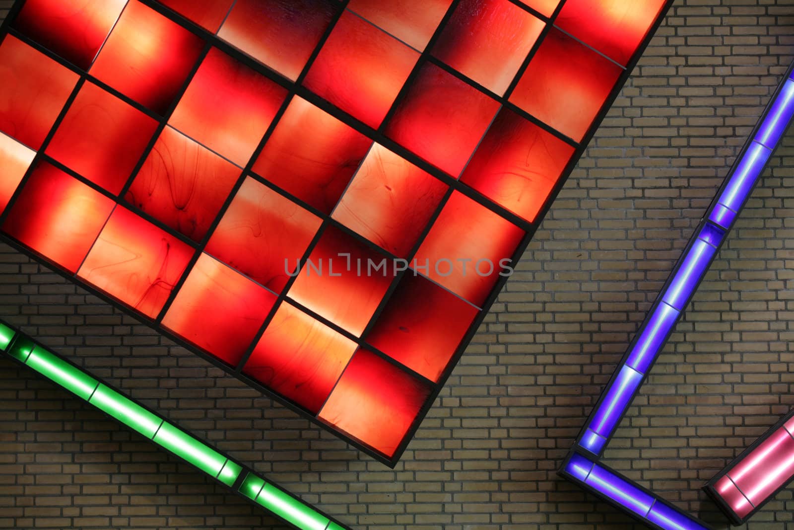 electrical neon  light indoor in a building wall