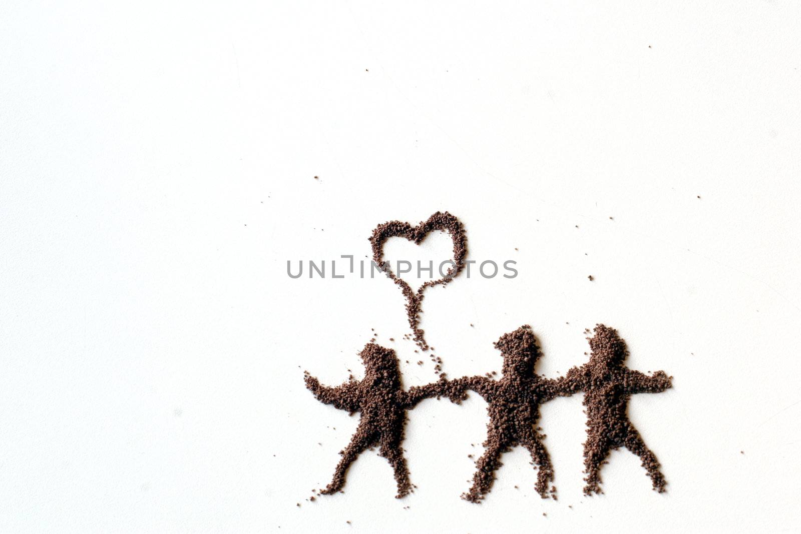 small  figures of man made in chocolate powder