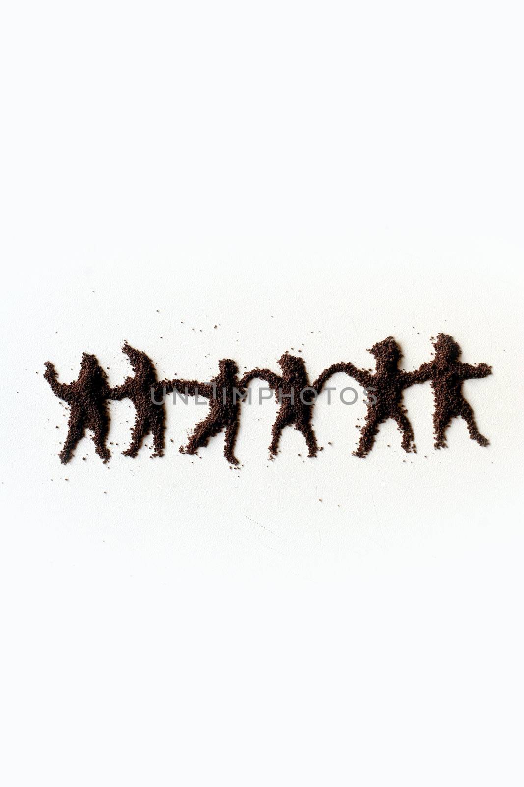 small  figures of man made in chocolate powder