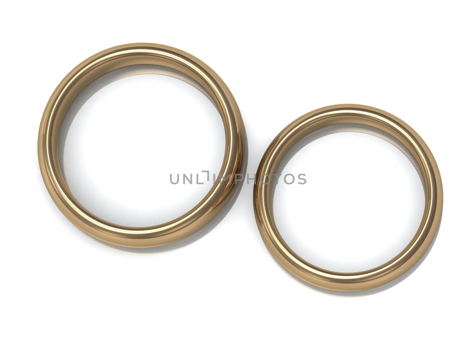 Two wedding rings on the top view of a white background