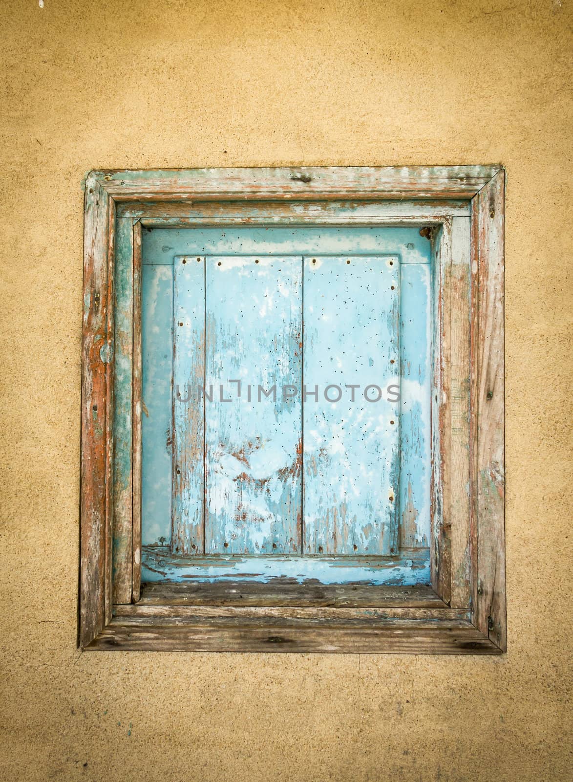 Small old wooden gate closed by doble.d