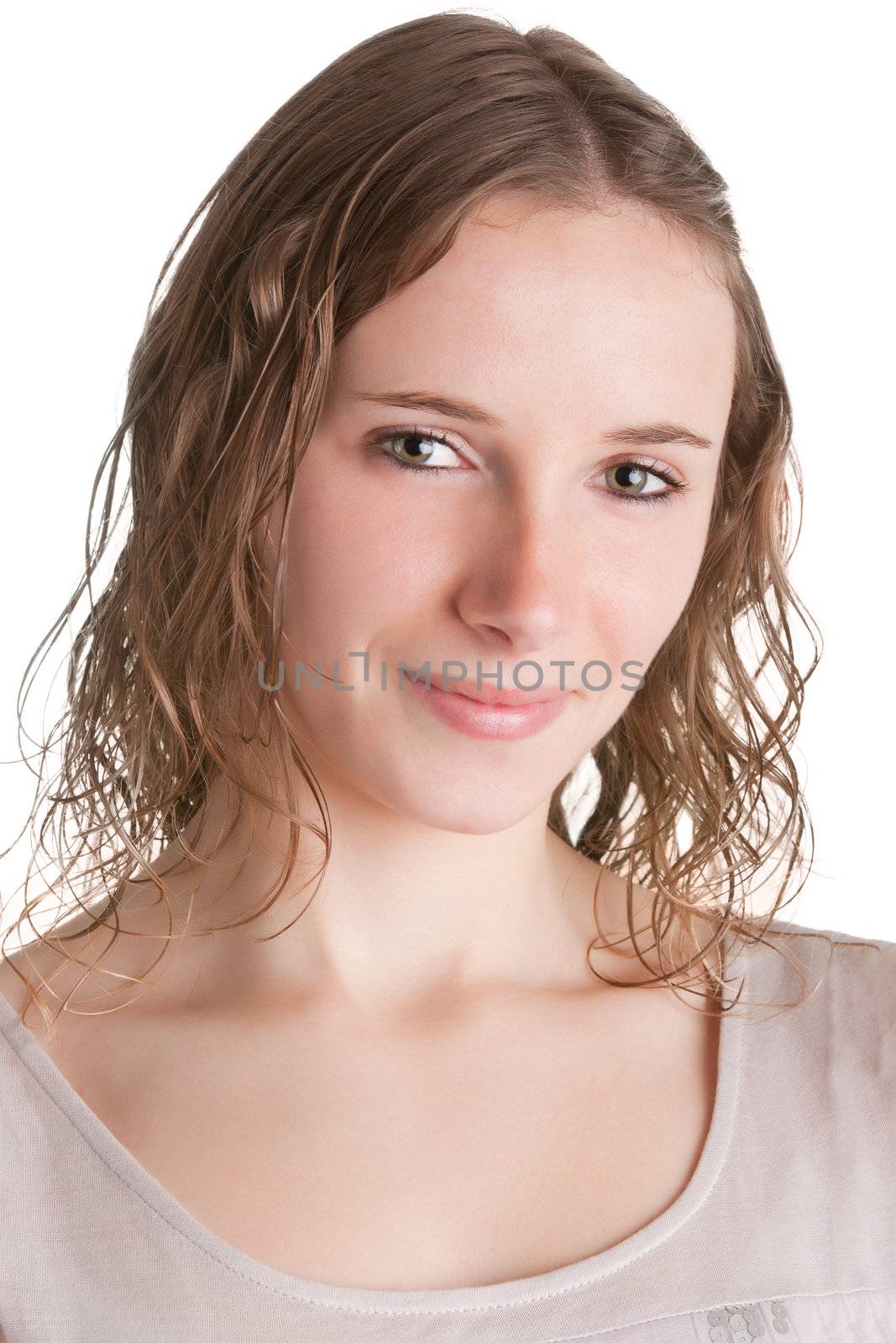 Portrait of a young woman smiling, isolated in a white background