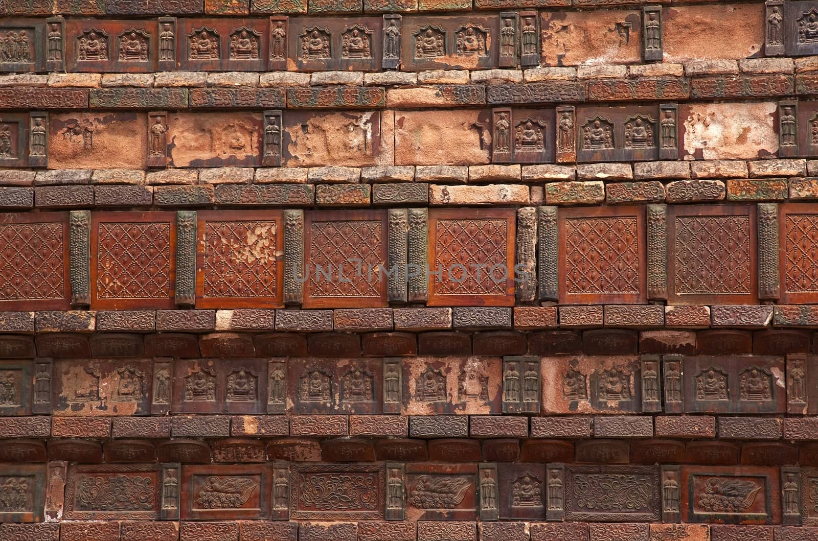 Ancient Bricks Buddhas Dancers Chinese Officials Iron Pagoda Buddhist Monument Kaifeng China Built in 1069 by the Kaibao Buddhist Monstary.  Best example of glazed brick pagoda in China