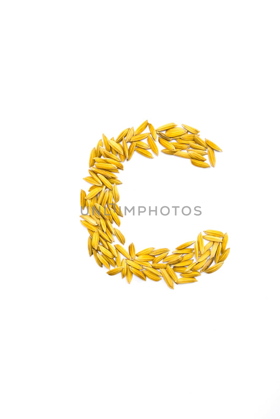 C letter of rice on a white background