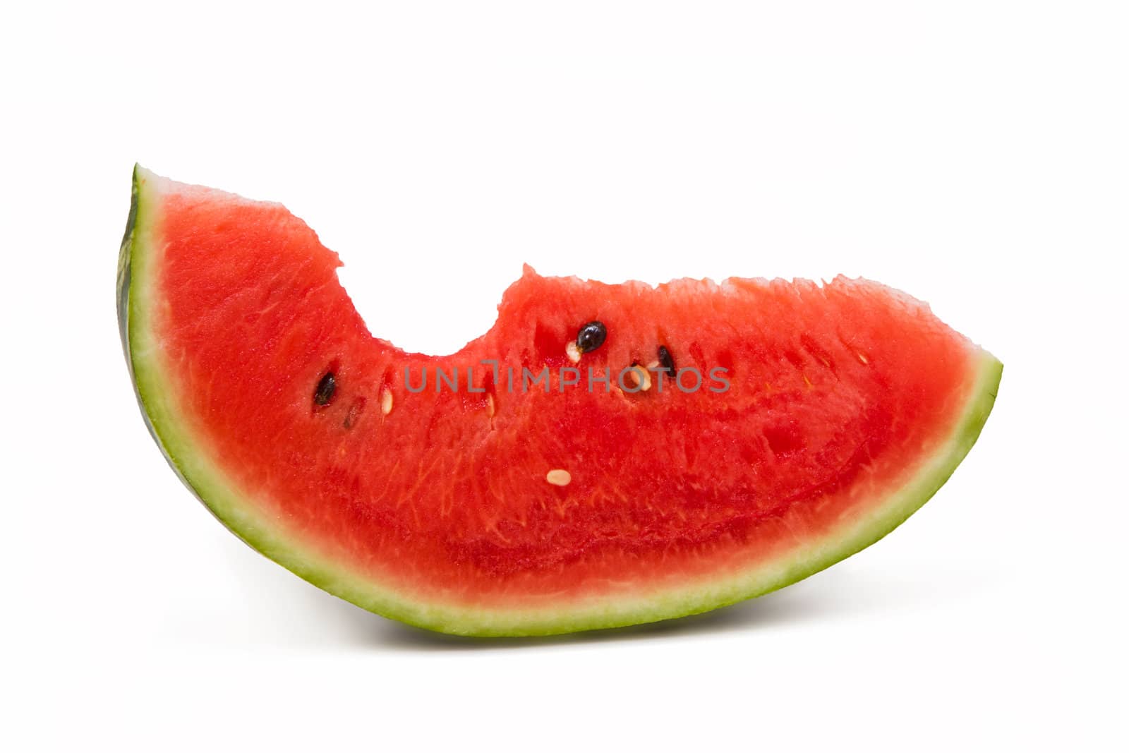 Bitten juicy watermelon portion isolated on white background, red fruit