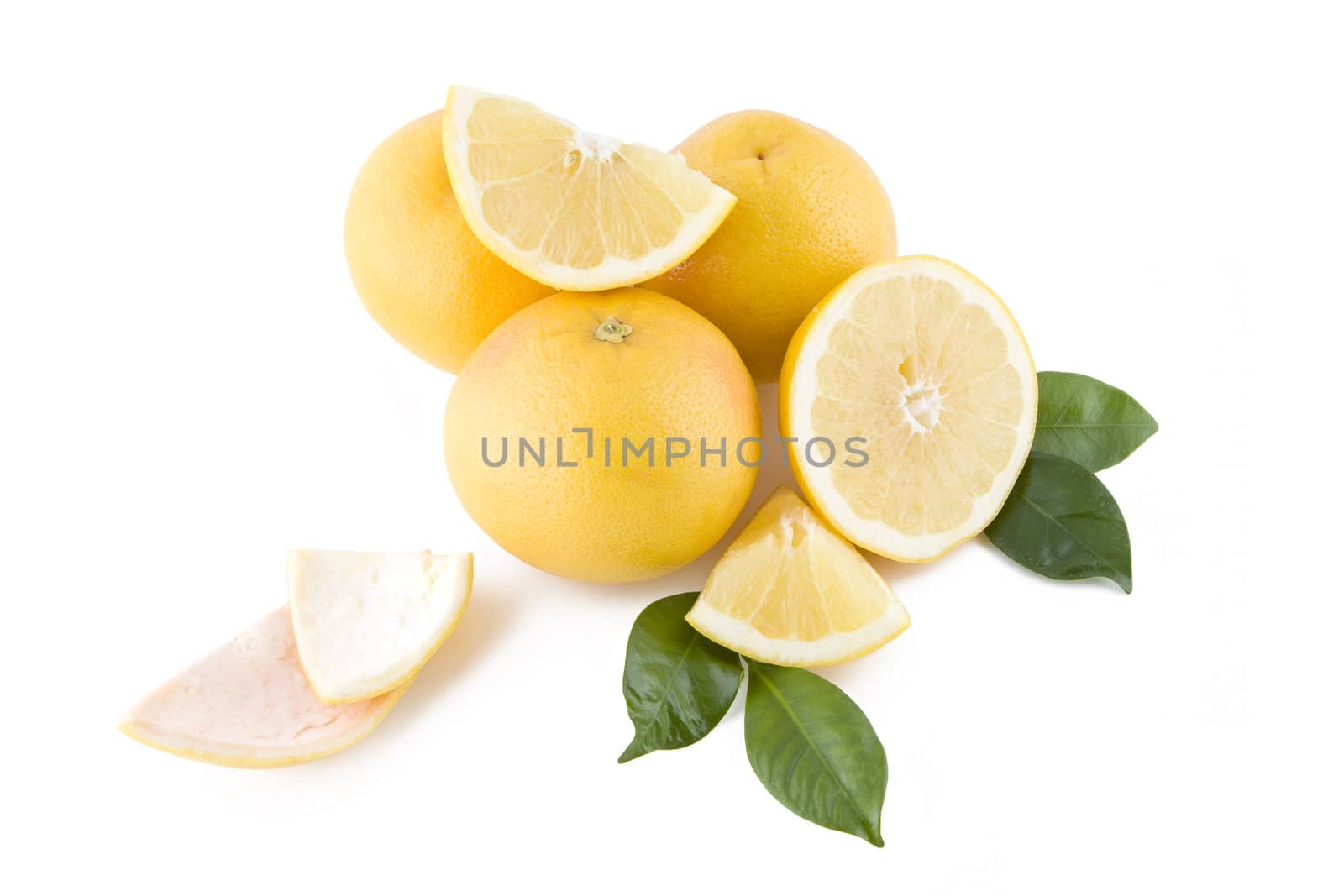 Juicy, fresh white grapefruits isolated on white background