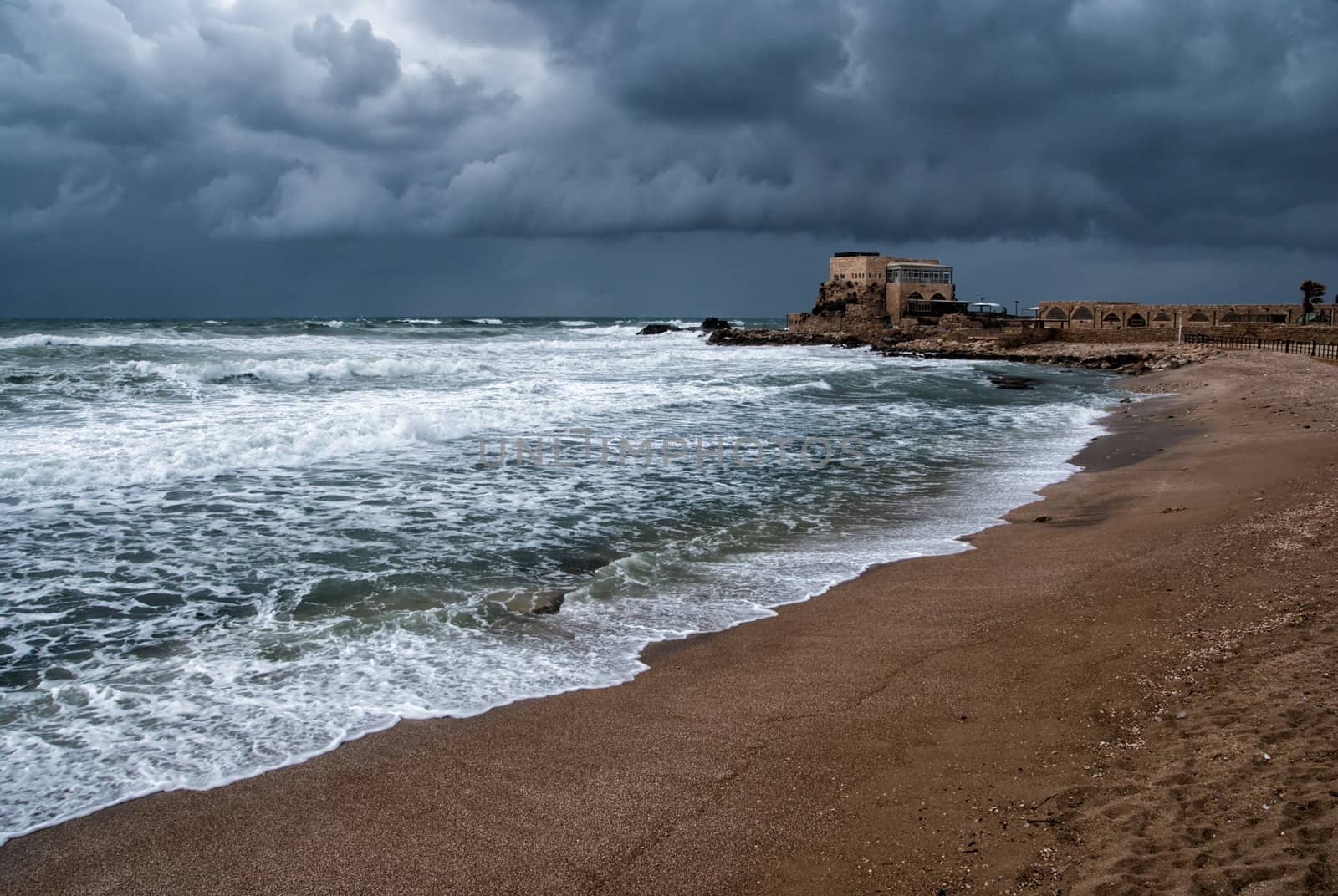 Ruins of harbor at Caesarea - ancient roman port in Israel