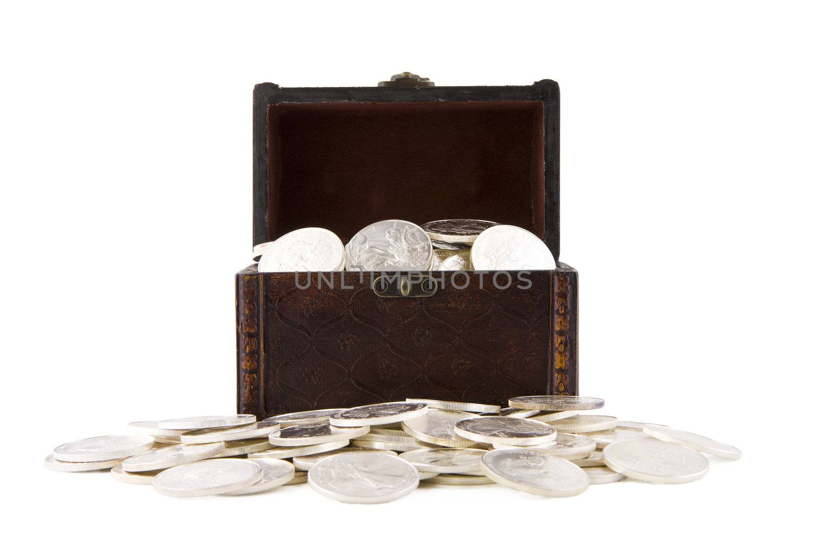 Old retro case with silver coins, isolated on white background