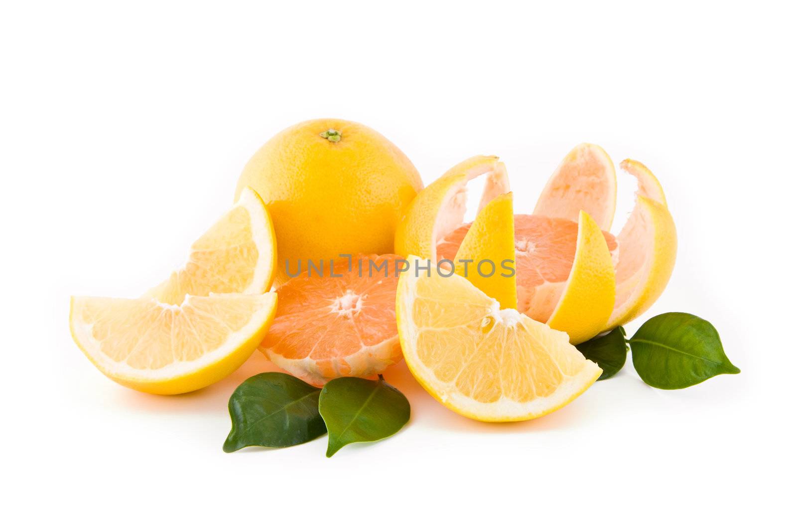Fresh sliced white and red grapefruits isolated on white