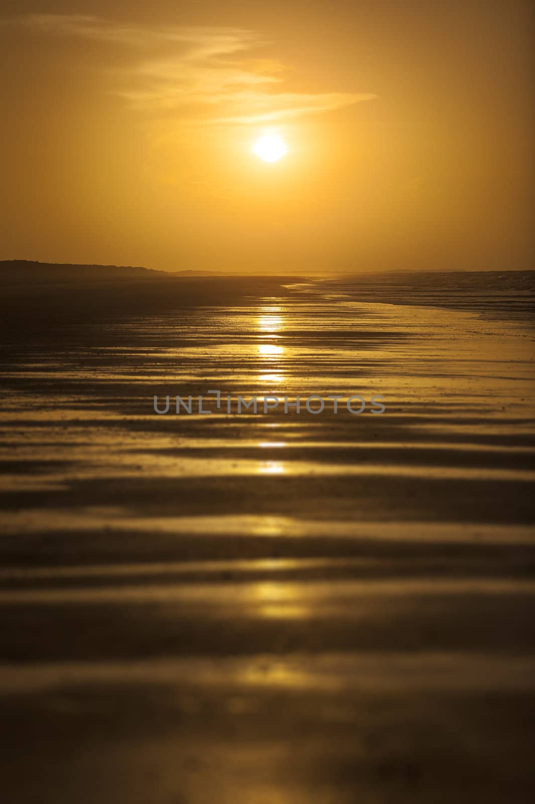 An image of a beautiful sunset over the ocean - Australia 80 mile beach