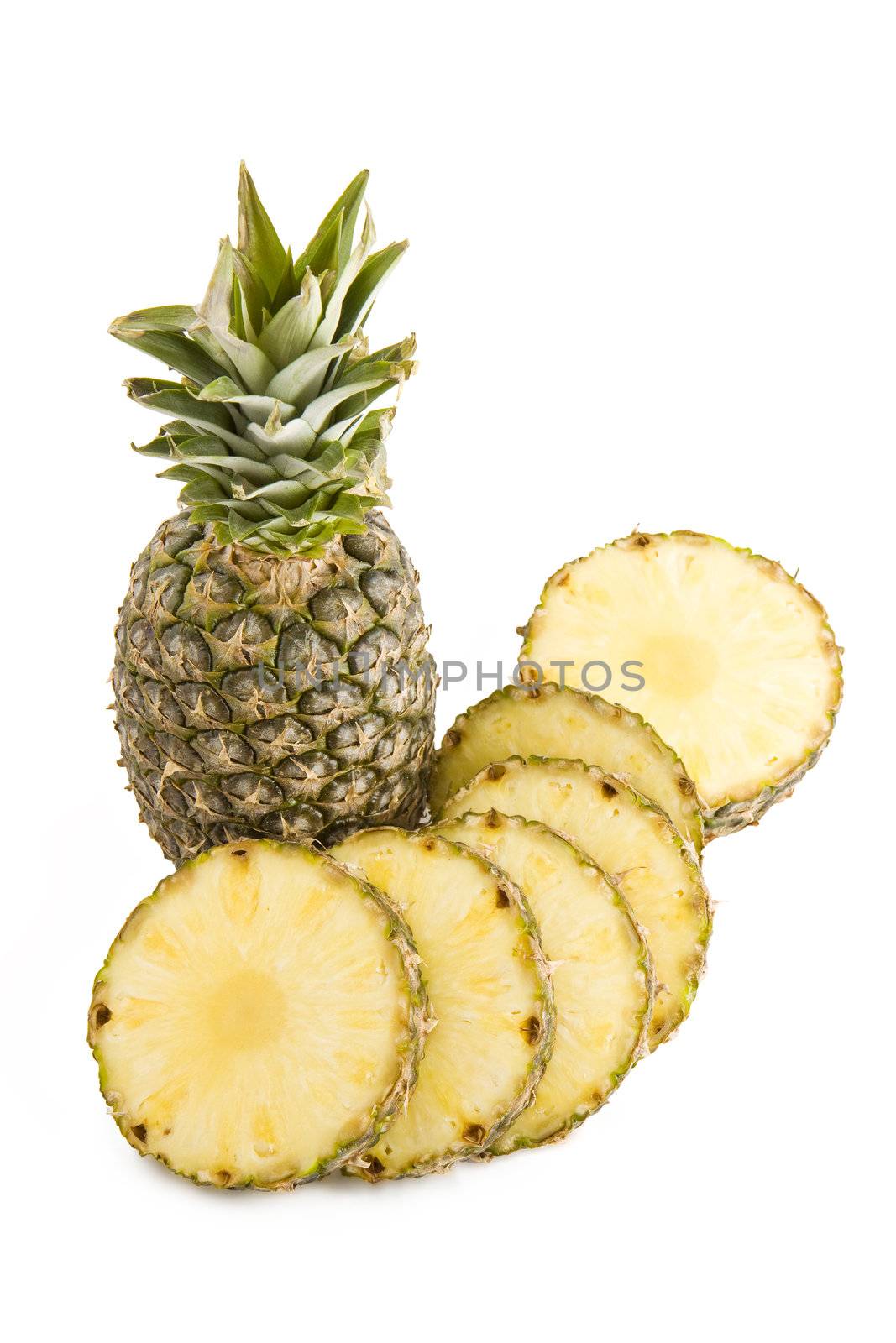 Fresh fruit pineapple slices isolated on white background